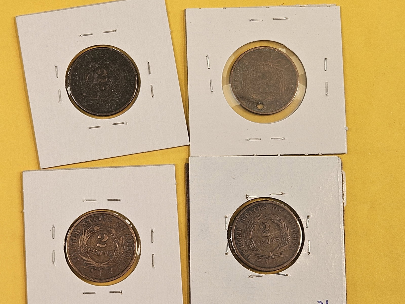 Four mixed 2-cent pieces - 4