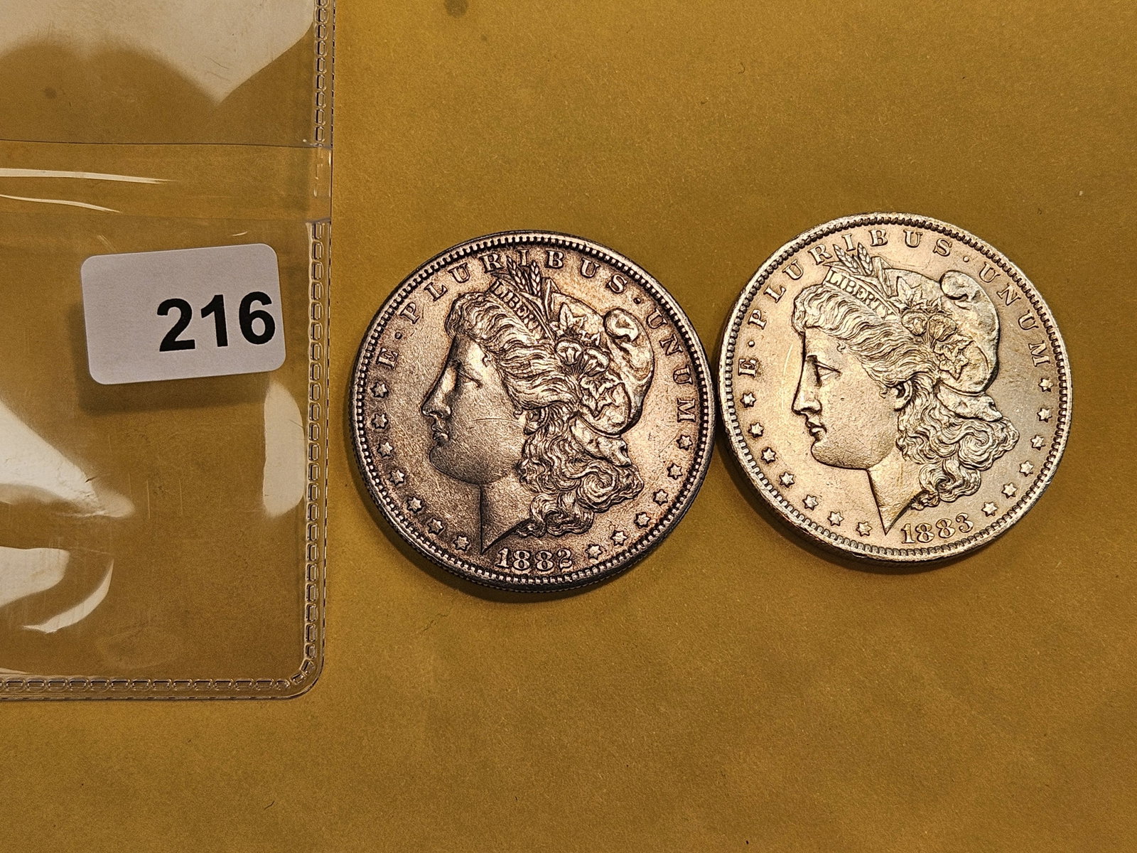 Two Bright About Uncirculated Morgan silver Dollars - 2