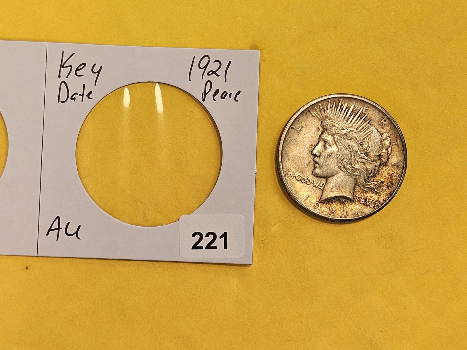 ** KEY DATE ** 1921 Peace silver Dollar in About Uncirculated - 2