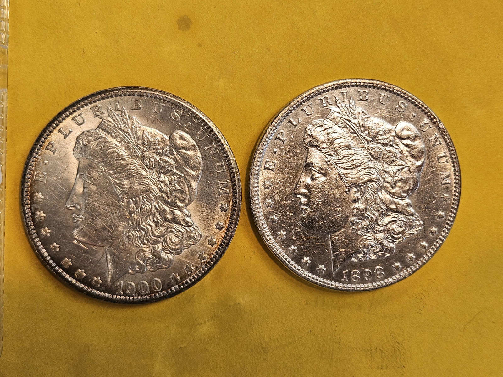 Two Bright About Uncirculated Morgan silver Dollars: Mixed