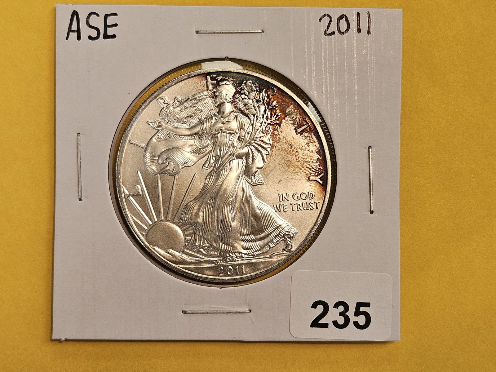 GEM Brilliant Uncirculated 2011 American Silver Eagle: Lightly toned