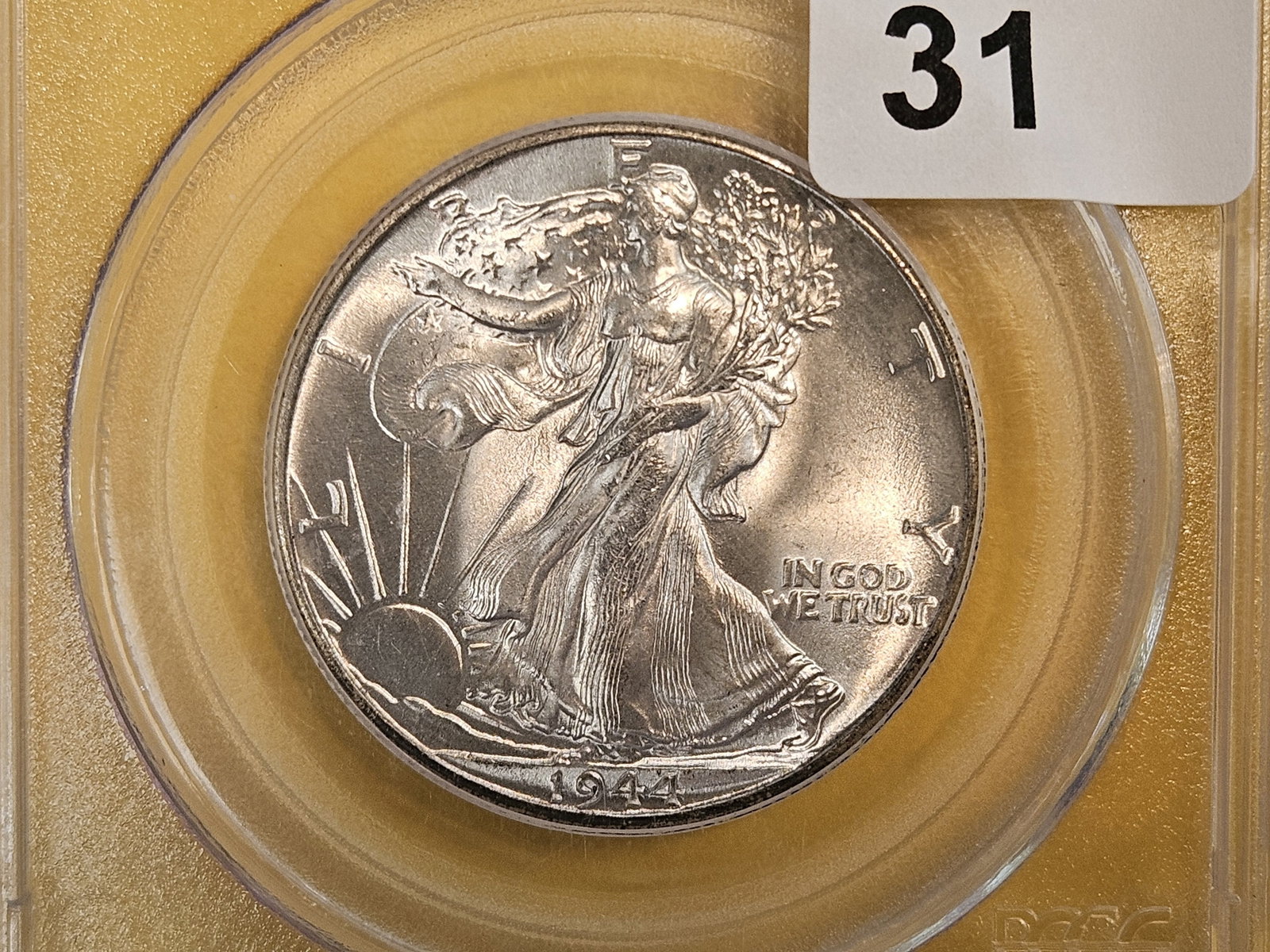 GEM! PCGS 1944 Walking Liberty half dollar in Mint State 66: Blazing luster