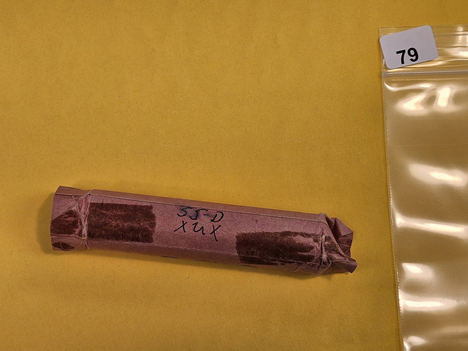 GEM Brilliant Uncirculated RED Roll of 1955-D Wheat cents: From an old collection. Originally wrapped in aluminum foil and then a bank wrapper. The older fellas would wrap these in aluminum because they thought it would preserve the coins better. Unsearched