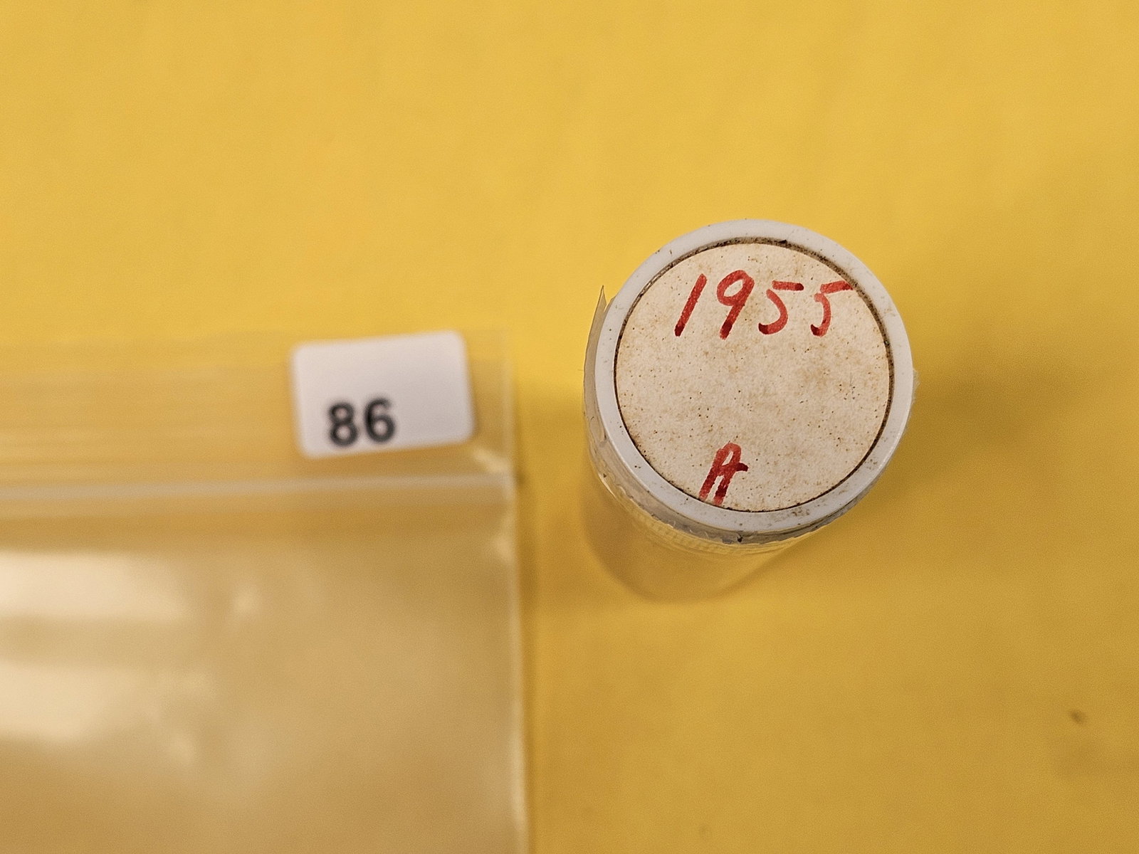 GEM Brilliant Uncirculated RED Roll of 1955 Wheat cents: From same old collection. Unsearched by us. One end shows BU GEM RED. Taped shut. Top says 1955