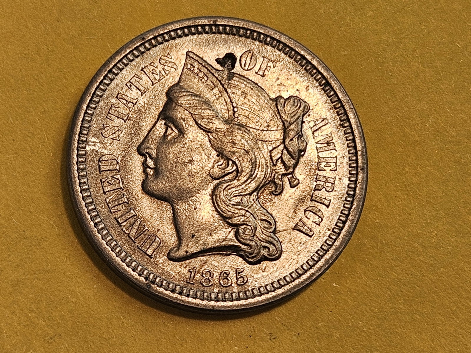 1865 Three Cent Nickel in Brilliant About Uncirculated plus - details: Light ding on obverse