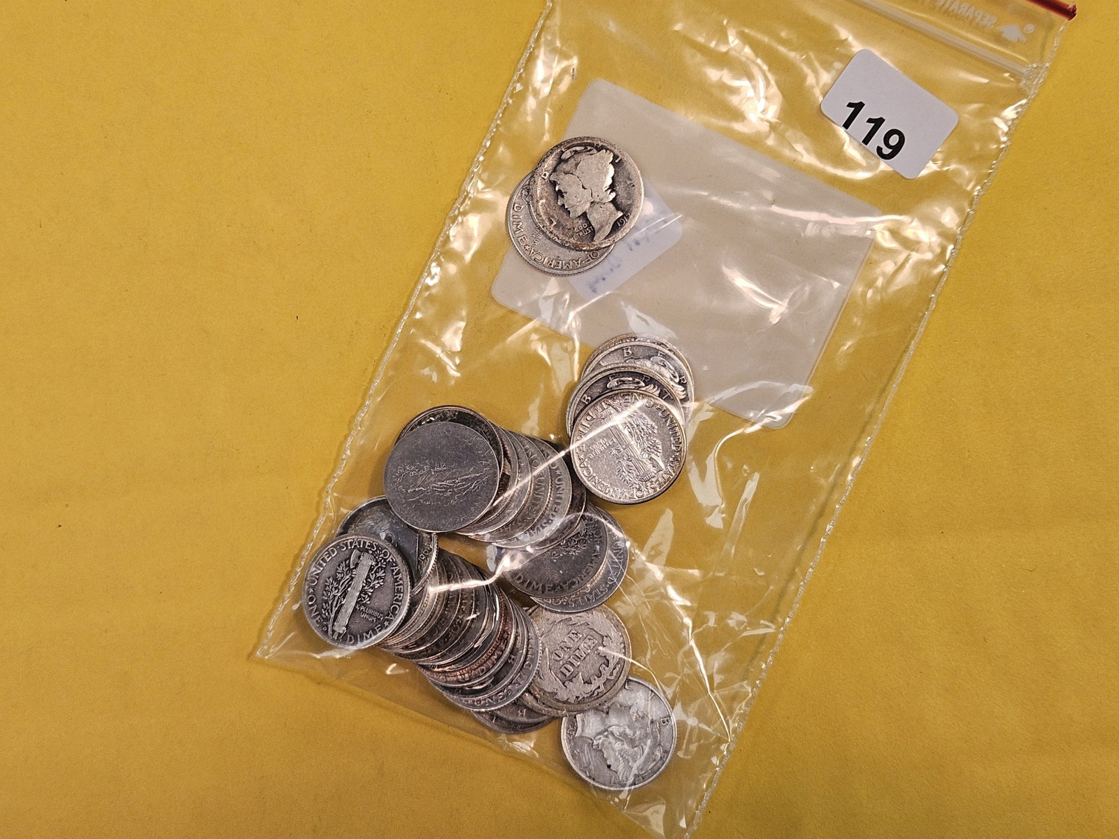 Thirty-Three mixed Silver Dimes: Barber, Mercury and Roosevelt. All silvers