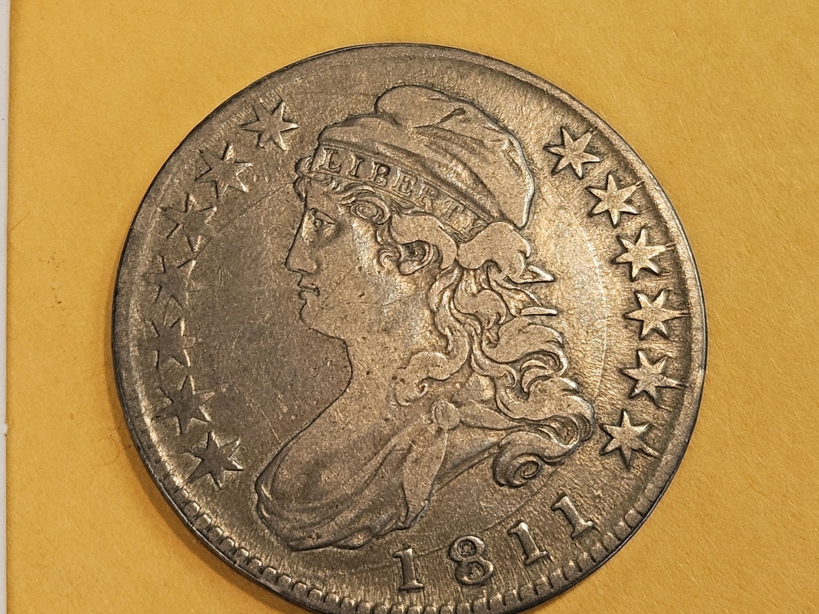 1811 Capped Bust Half Dollar in Very Fine: Dealer called it the Overton O-104B version. R-1.