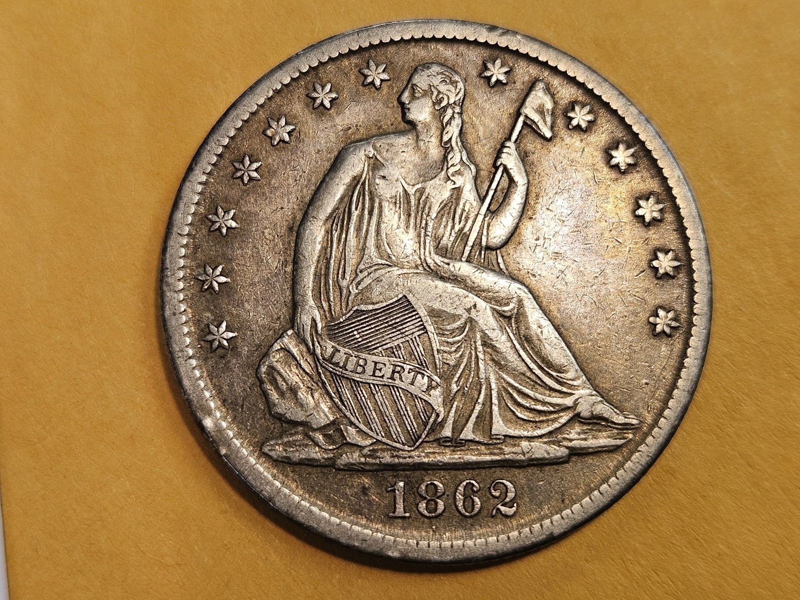 1862-S Seated Liberty silver half dollar in Extra Fine plus: Civil War Issue. Looks like the small-wide "S" variety. Broken "S" mint mark