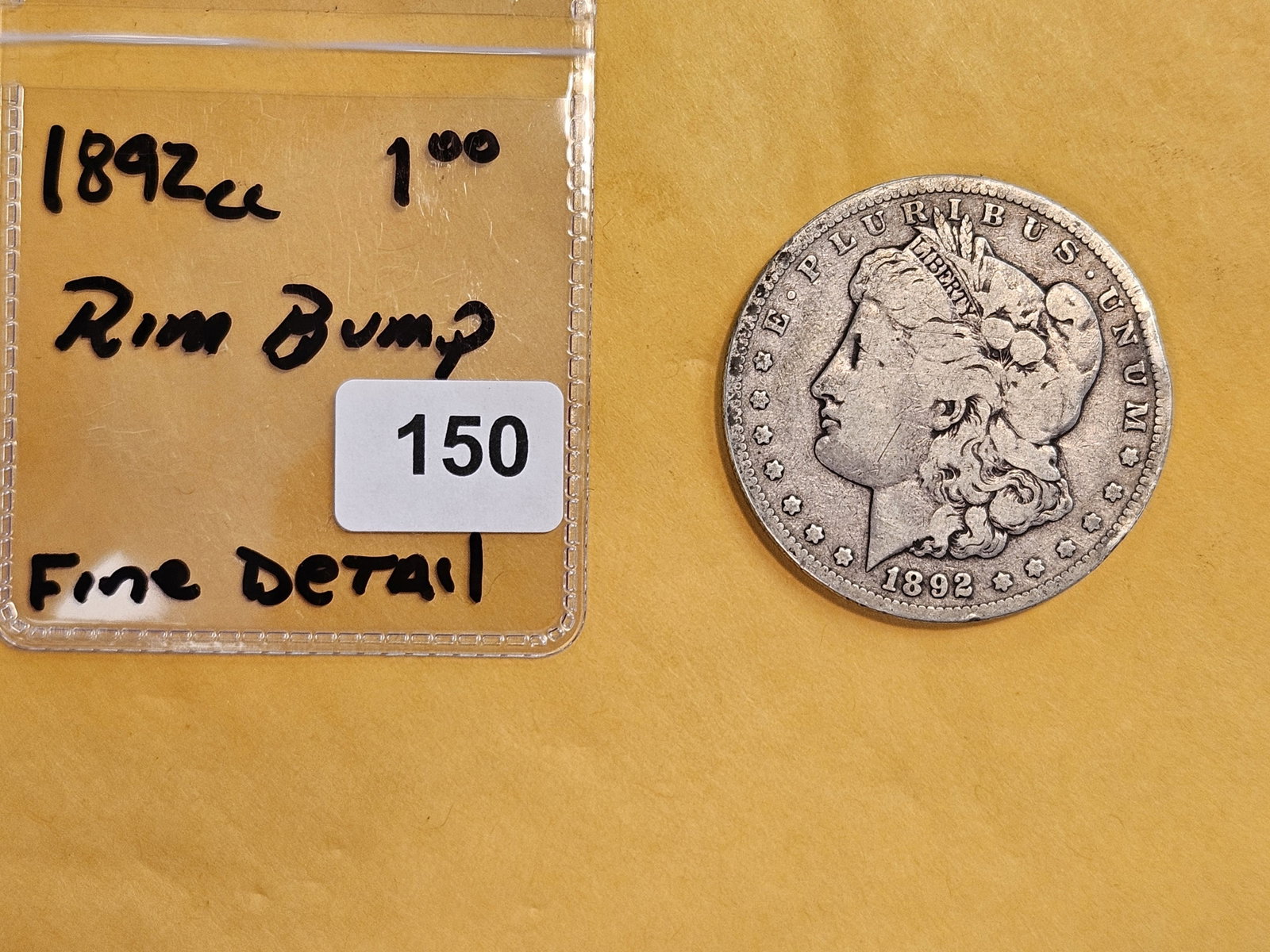 ** KEY DATE ** 1892-CC Morgan Dollar in Fine - details - 2