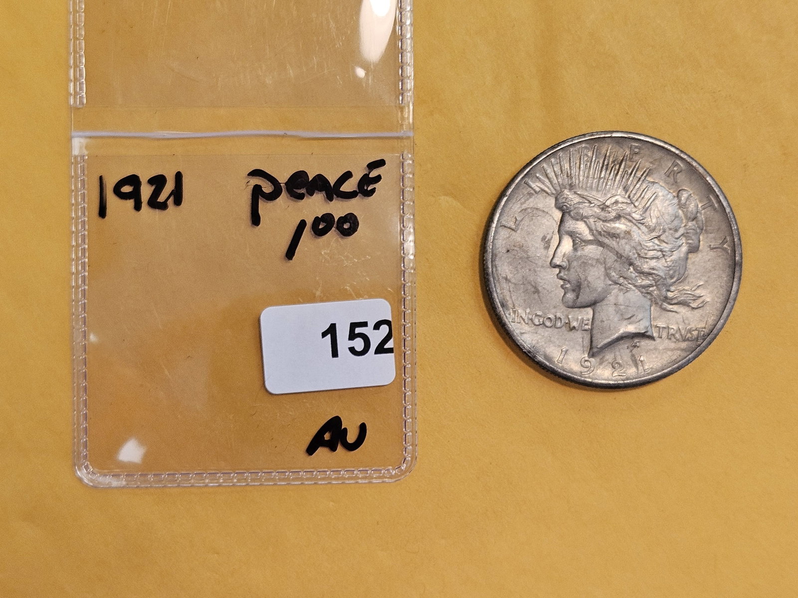 ** KEY DATE ** 1921 Peace silver Dollar in About Uncirculated - 2