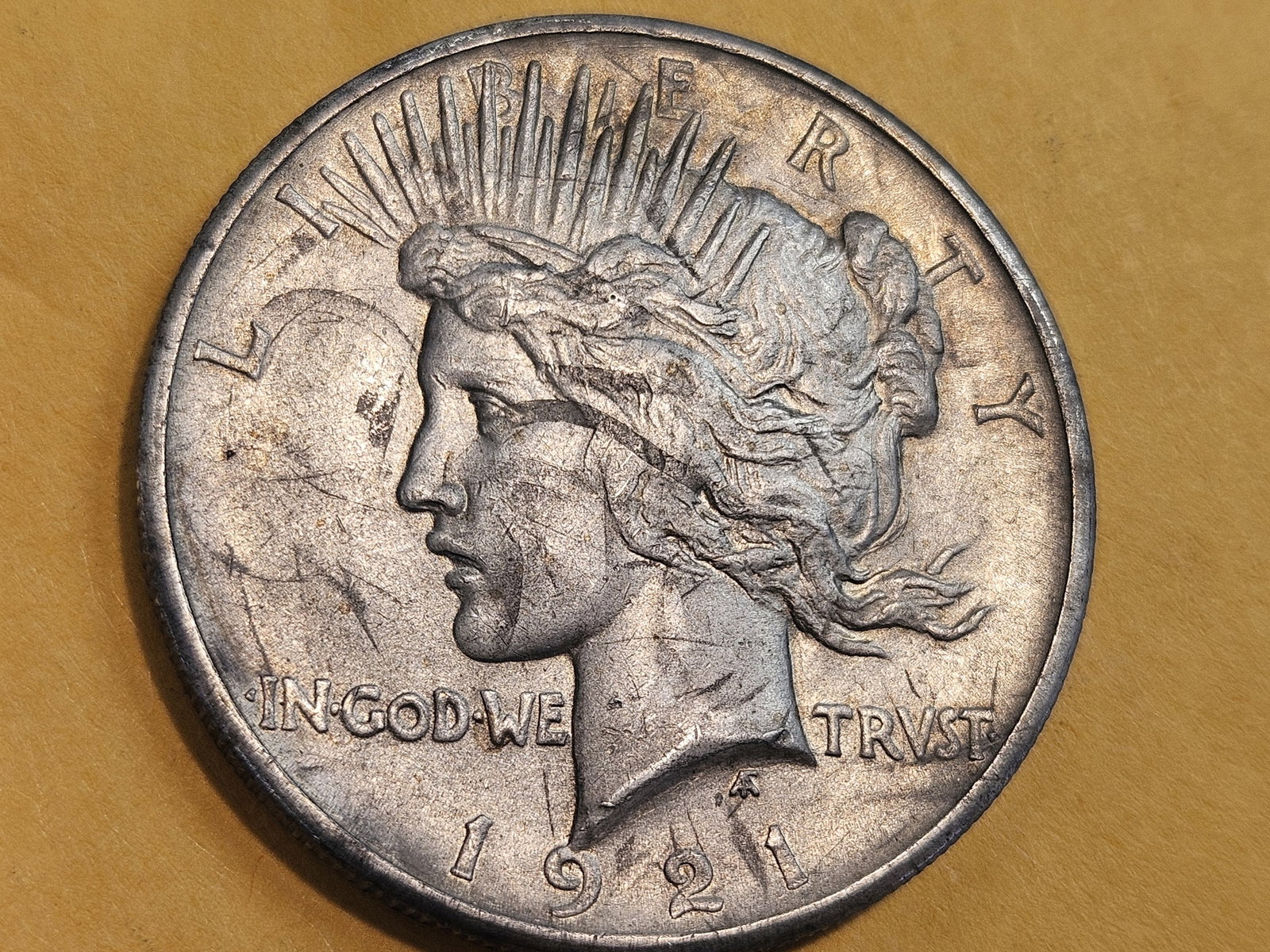 ** KEY DATE ** 1921 Peace silver Dollar in About Uncirculated - 4