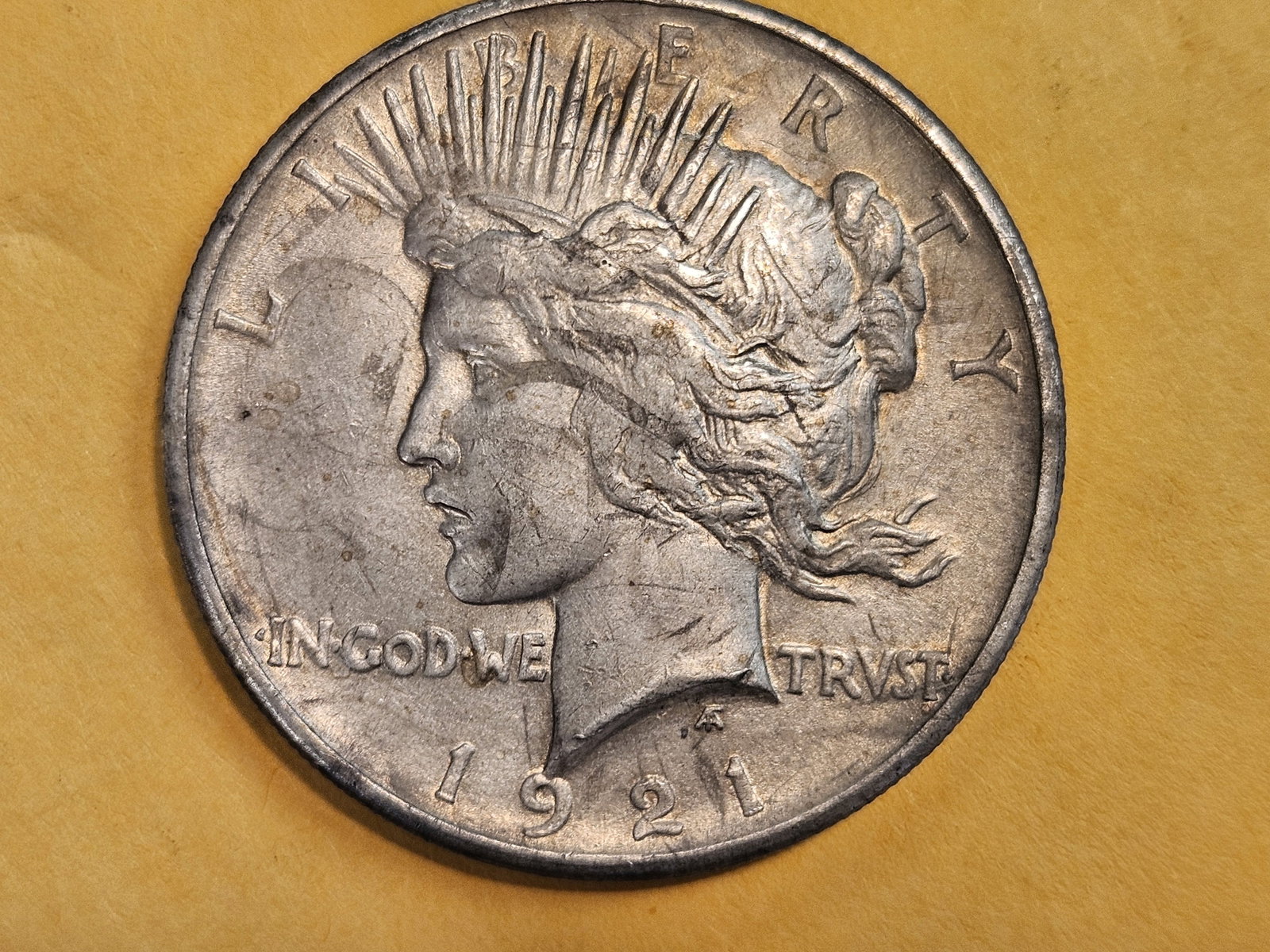 ** KEY DATE ** 1921 Peace silver Dollar in About Uncirculated - 5