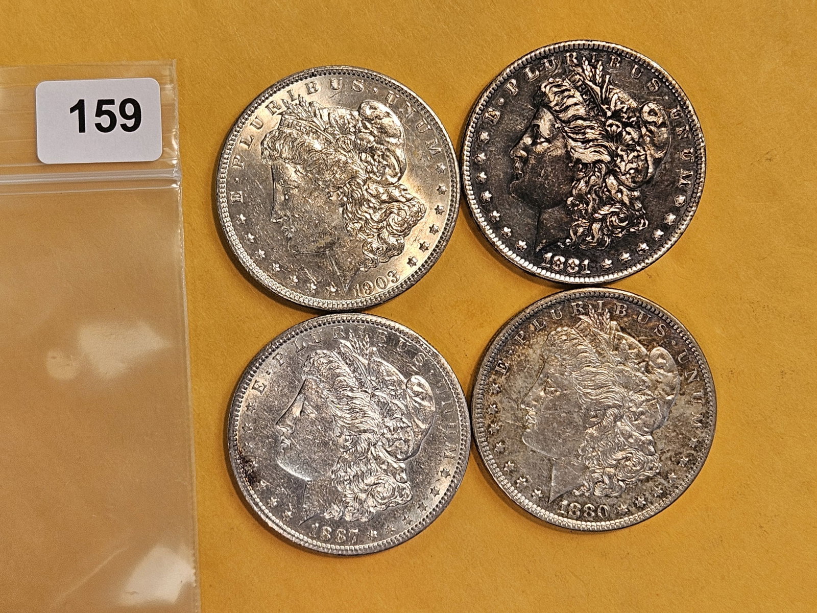 Four mixed Morgan silver Dollars (1 of 4)