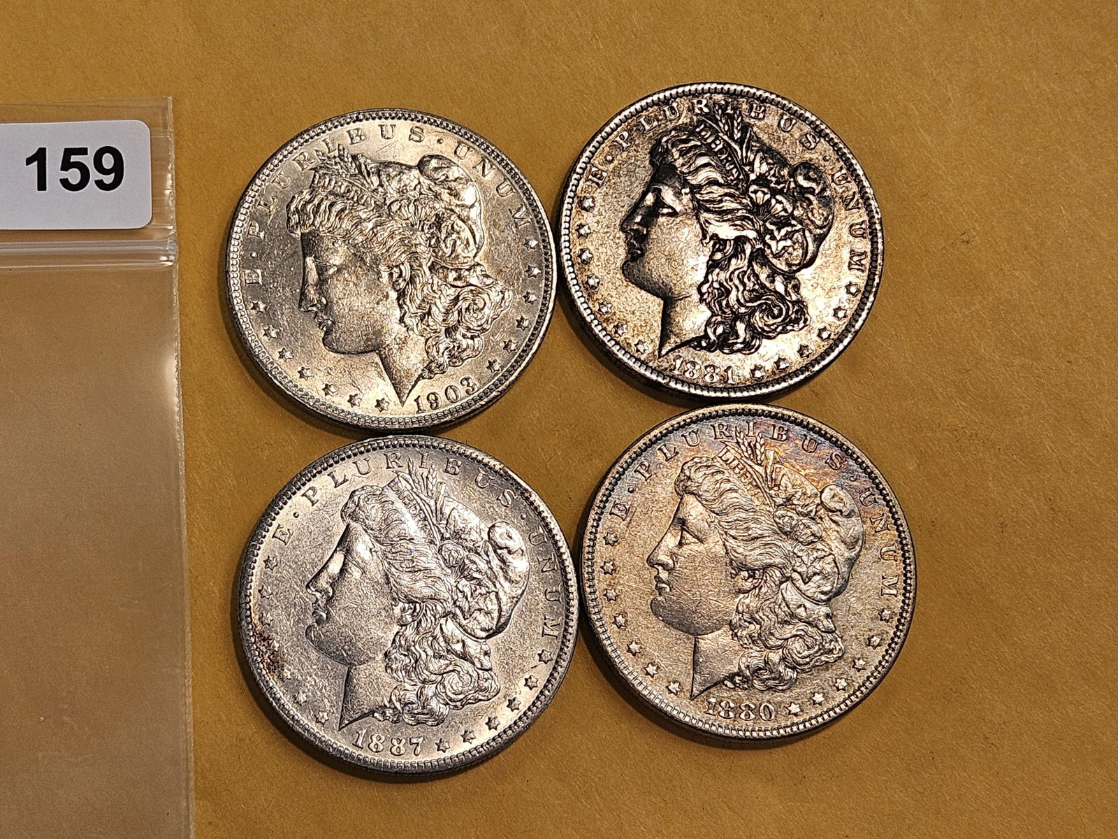 Four mixed Morgan silver Dollars - 2