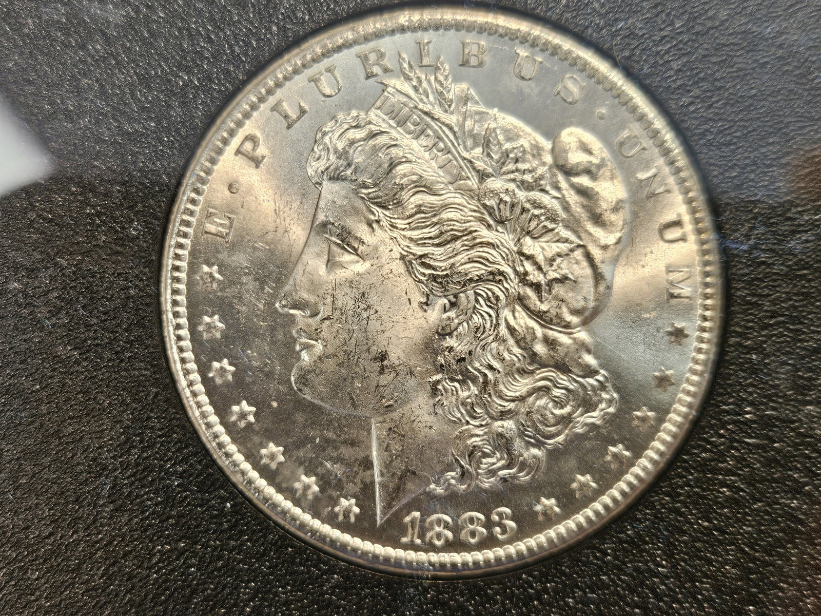 ** KEY DATE ** GSA 1883-CC Morgan Dollar in Very Choice Brilliant Uncirculated - 5