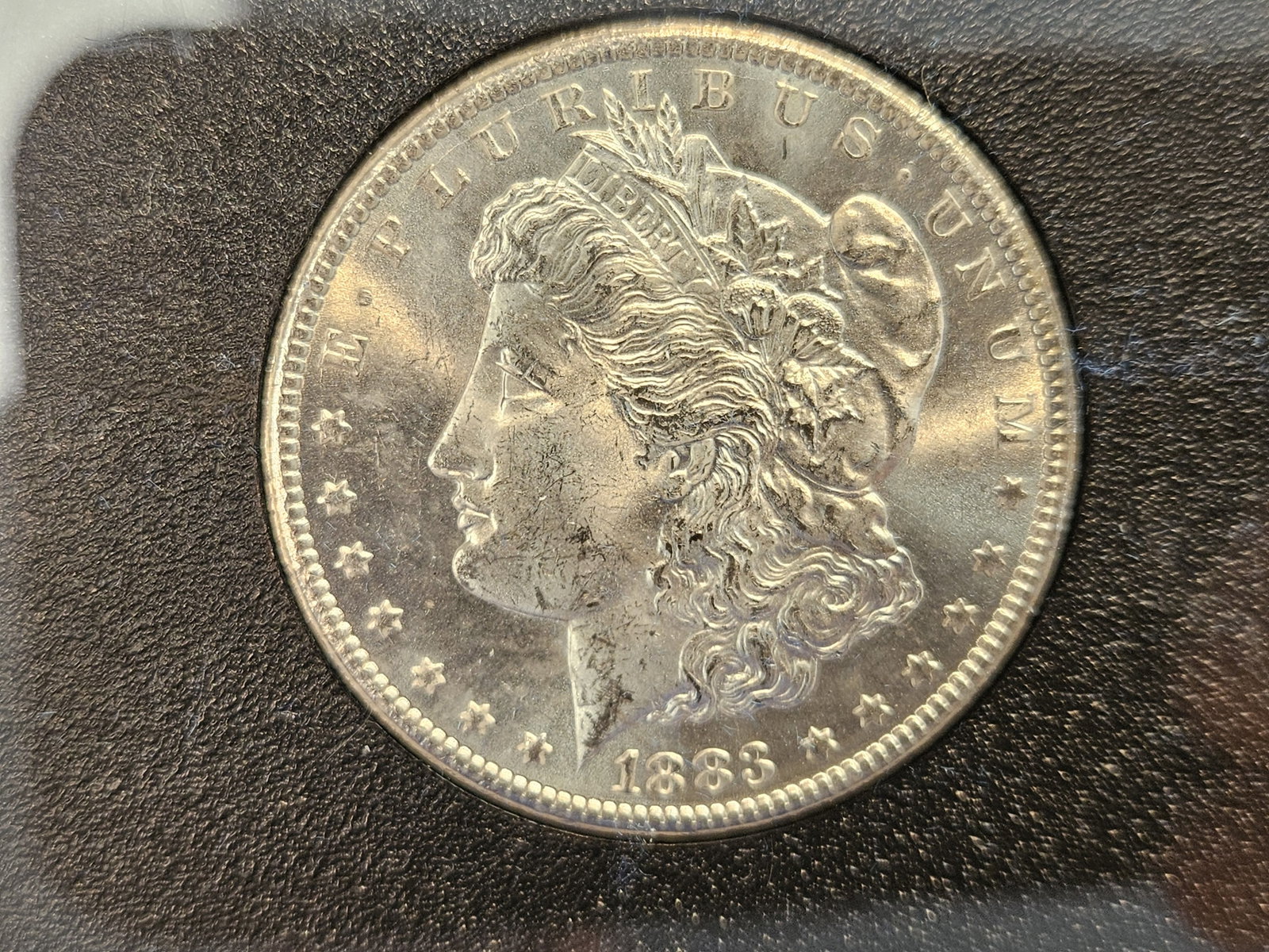 ** KEY DATE ** GSA 1883-CC Morgan Dollar in Very Choice Brilliant Uncirculated - 6