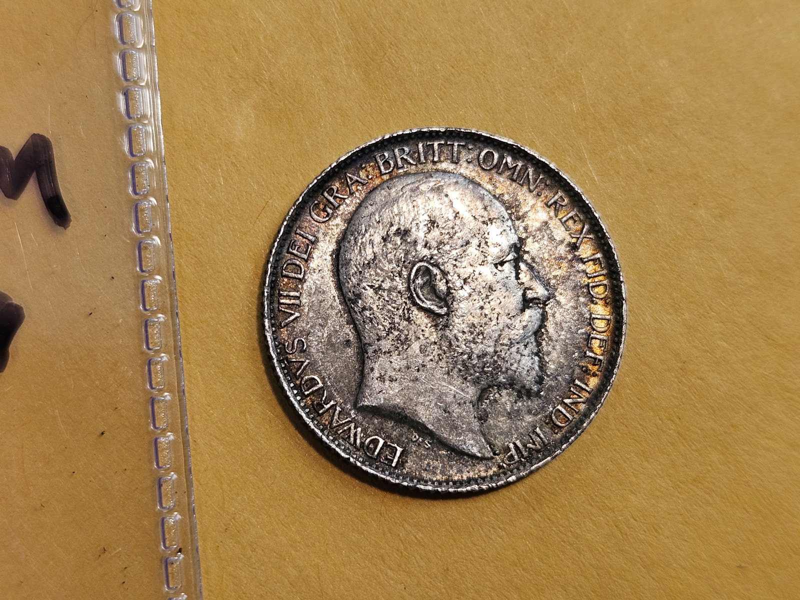 Brilliant Uncirculated 1909 Great Britain silver 6 pence: Great luster under a light patina. KM 799