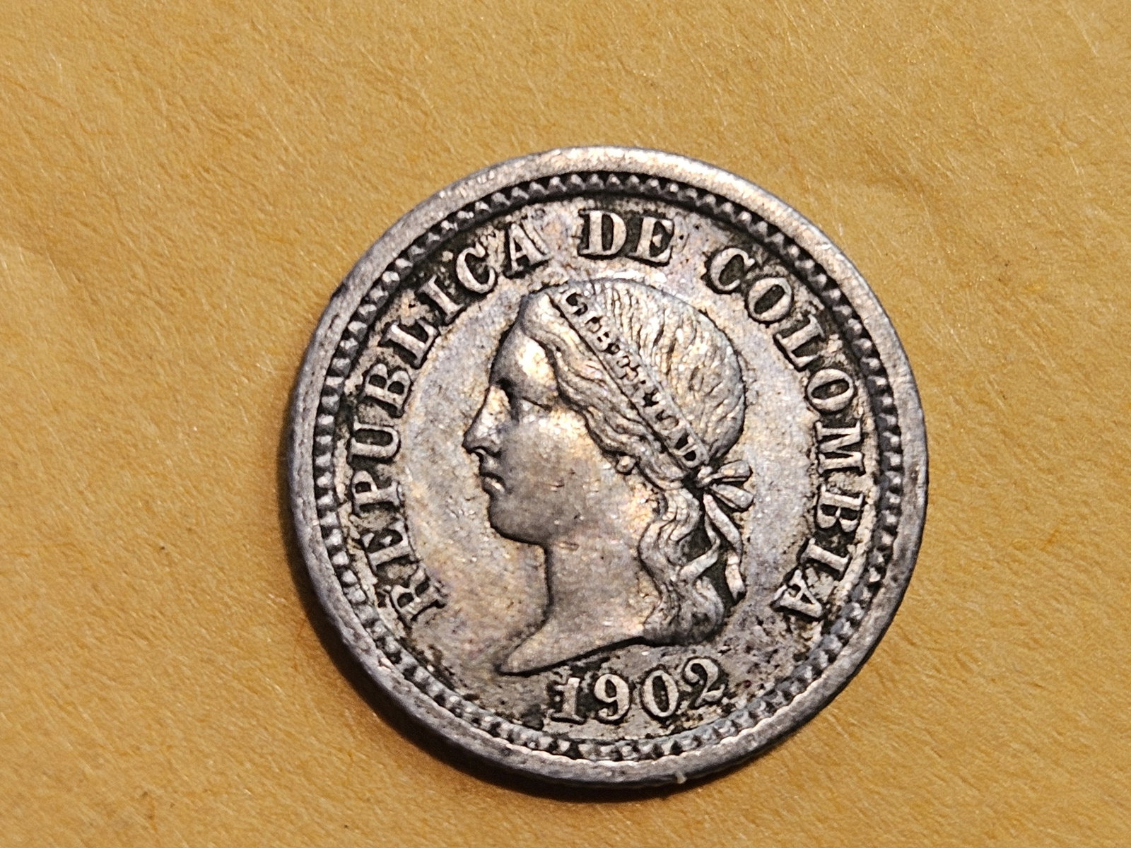 Nice About Uncirculated 1902 Colombia five cent: KM 191