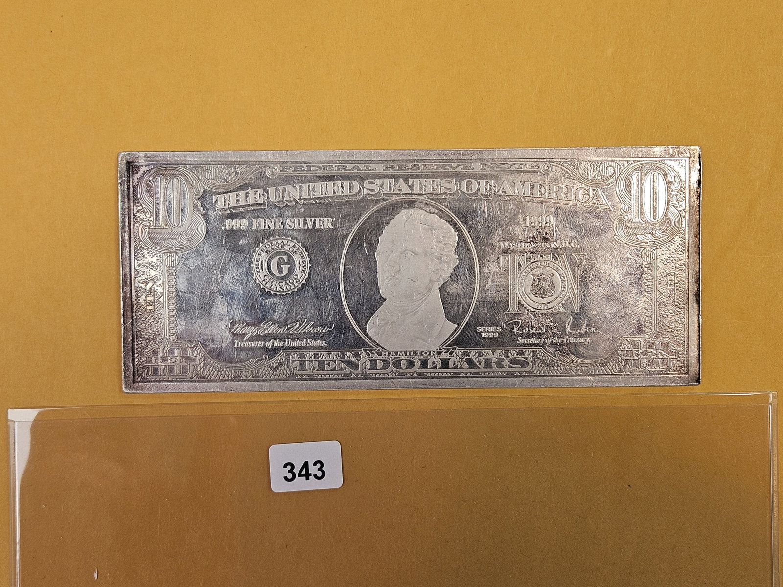 Four Troy ounce .999 fine silver Ten Dollar Replica: Weighs 4.15 Troy ounces or 129 grams.