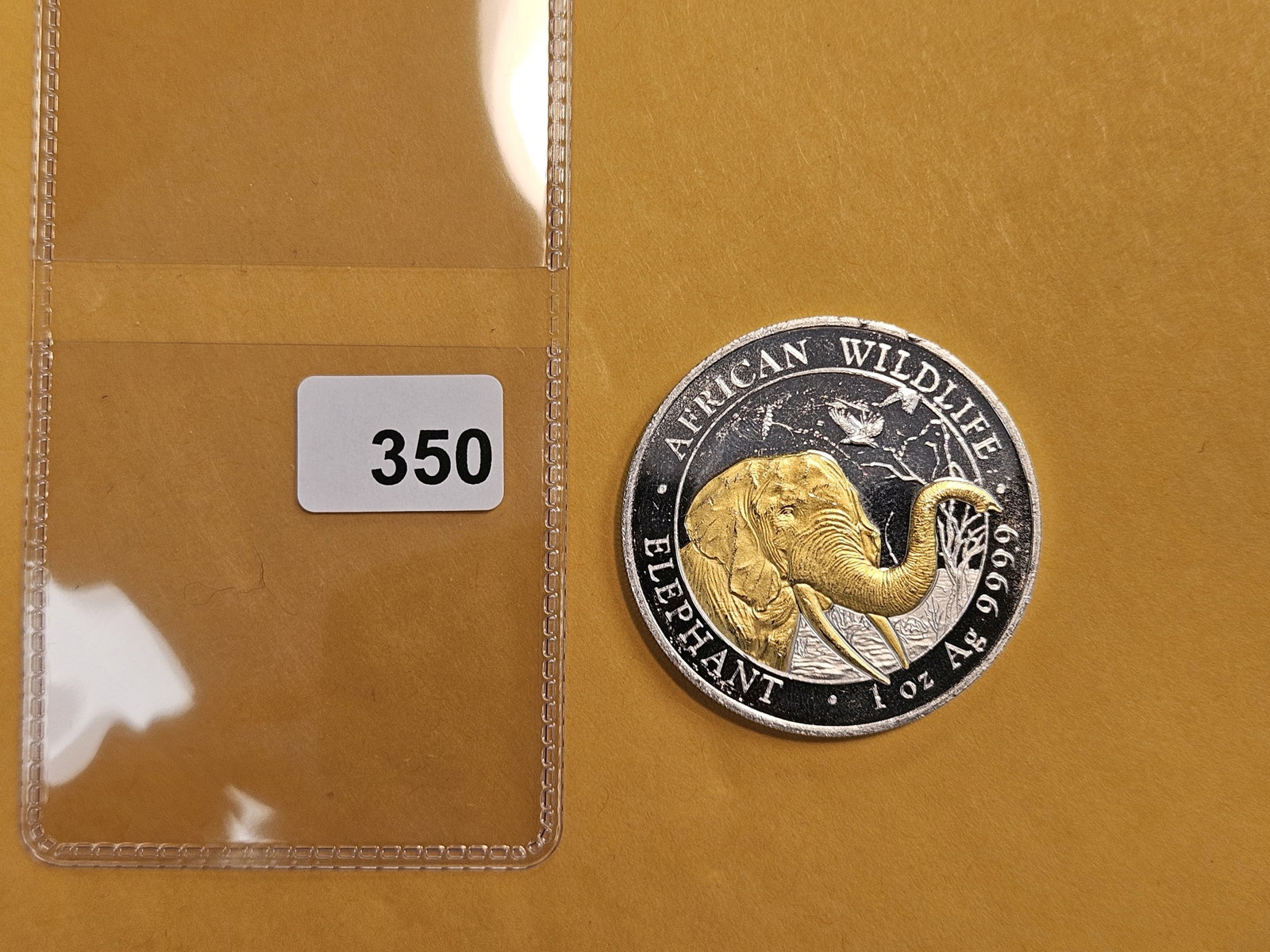 One Troy ounce .999 fine silver art round: Somali Republic. Gilted Elephant