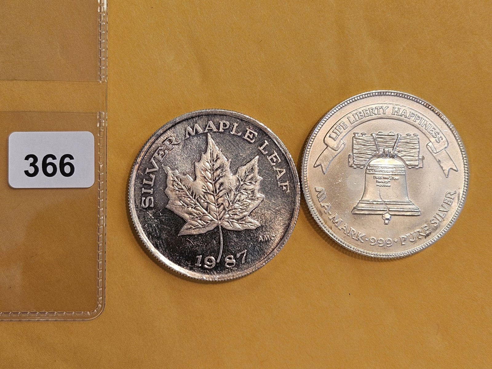 Two 1-Troy ounce .999 fine silver art rounds (1 of 2)