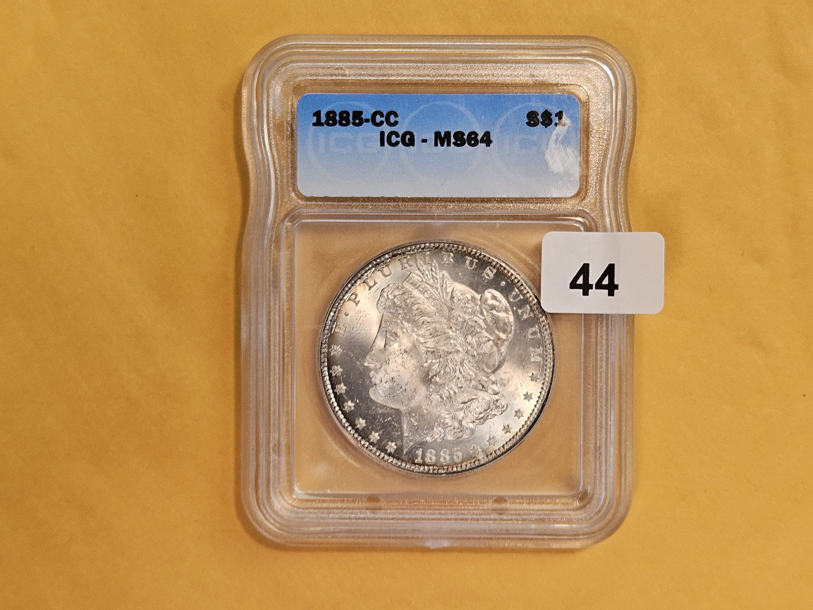 ** KEY DATE ** ICG 1885-CC Morgan Dollar in Mint State 64 - 2