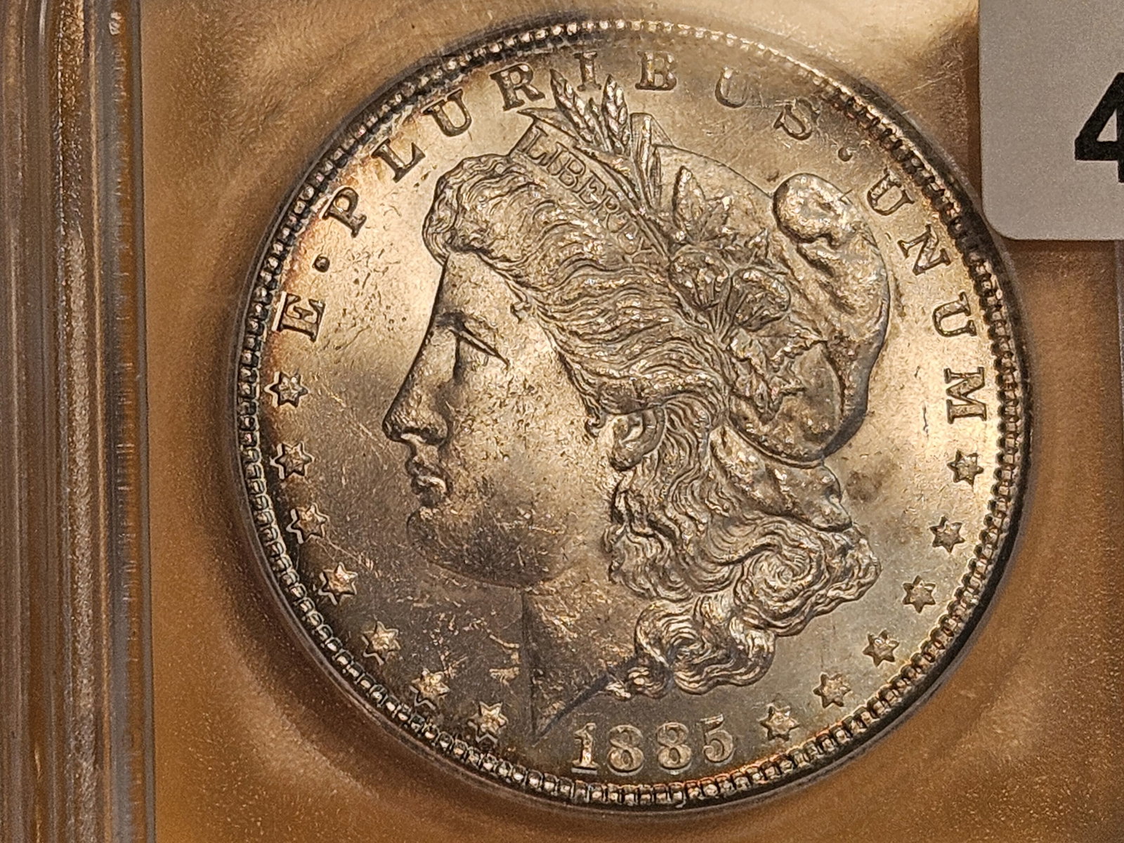 ** KEY DATE ** ICG 1885-CC Morgan Dollar in Mint State 64 - 5