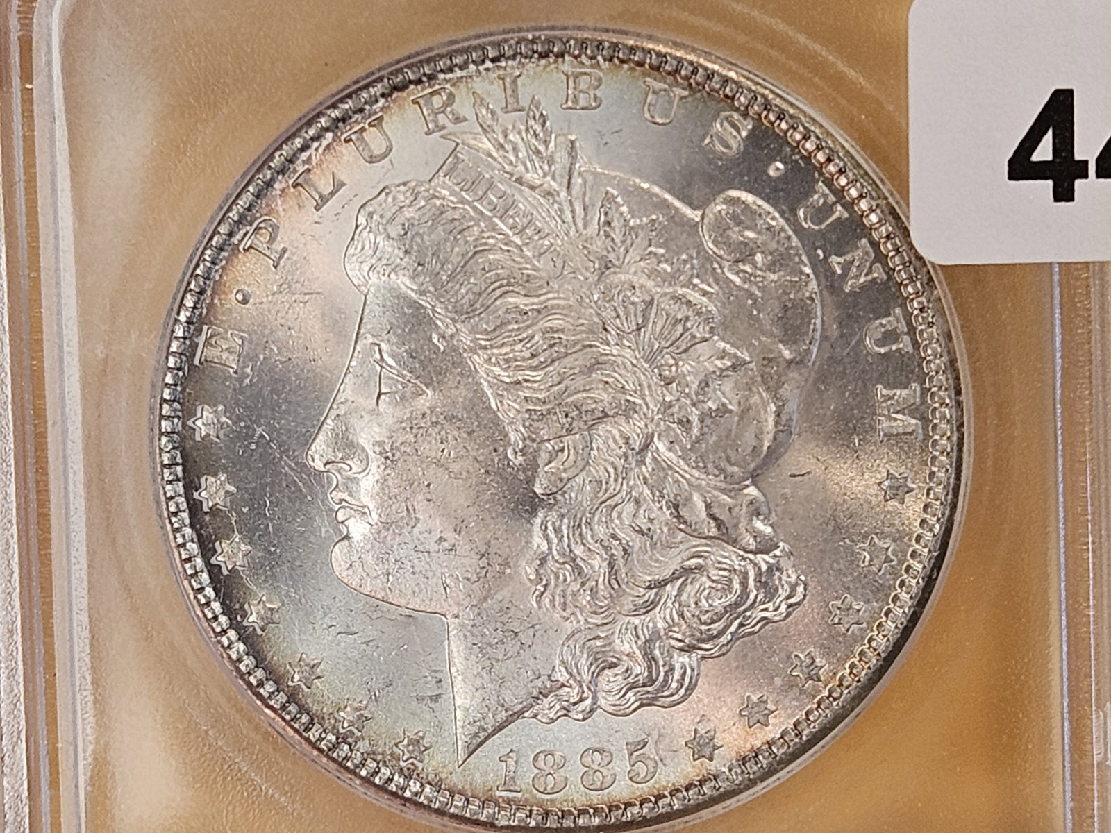 ** KEY DATE ** ICG 1885-CC Morgan Dollar in Mint State 64 - 6