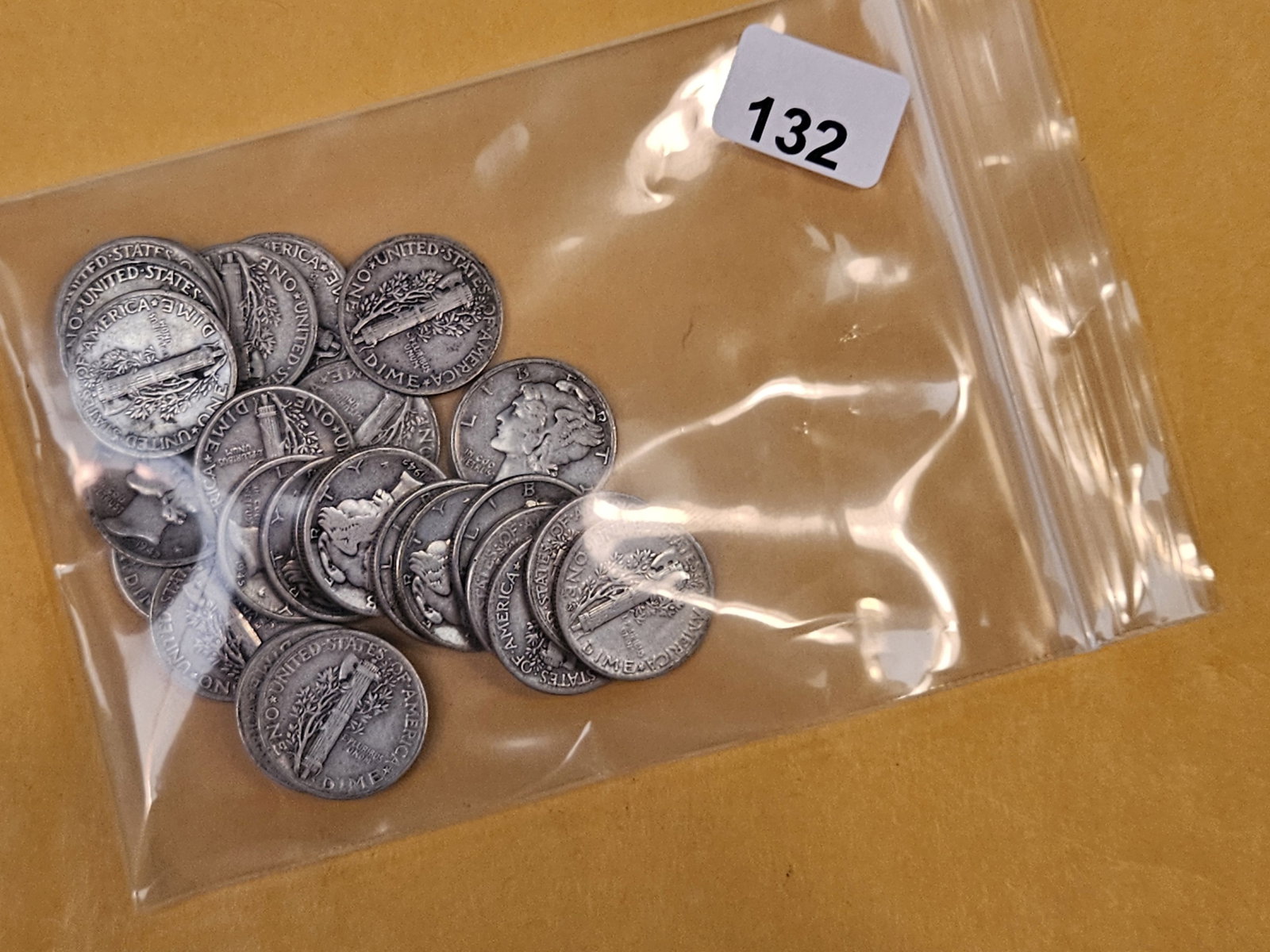 Twenty-nine mixed silver Mercury Dimes (1 of 2)