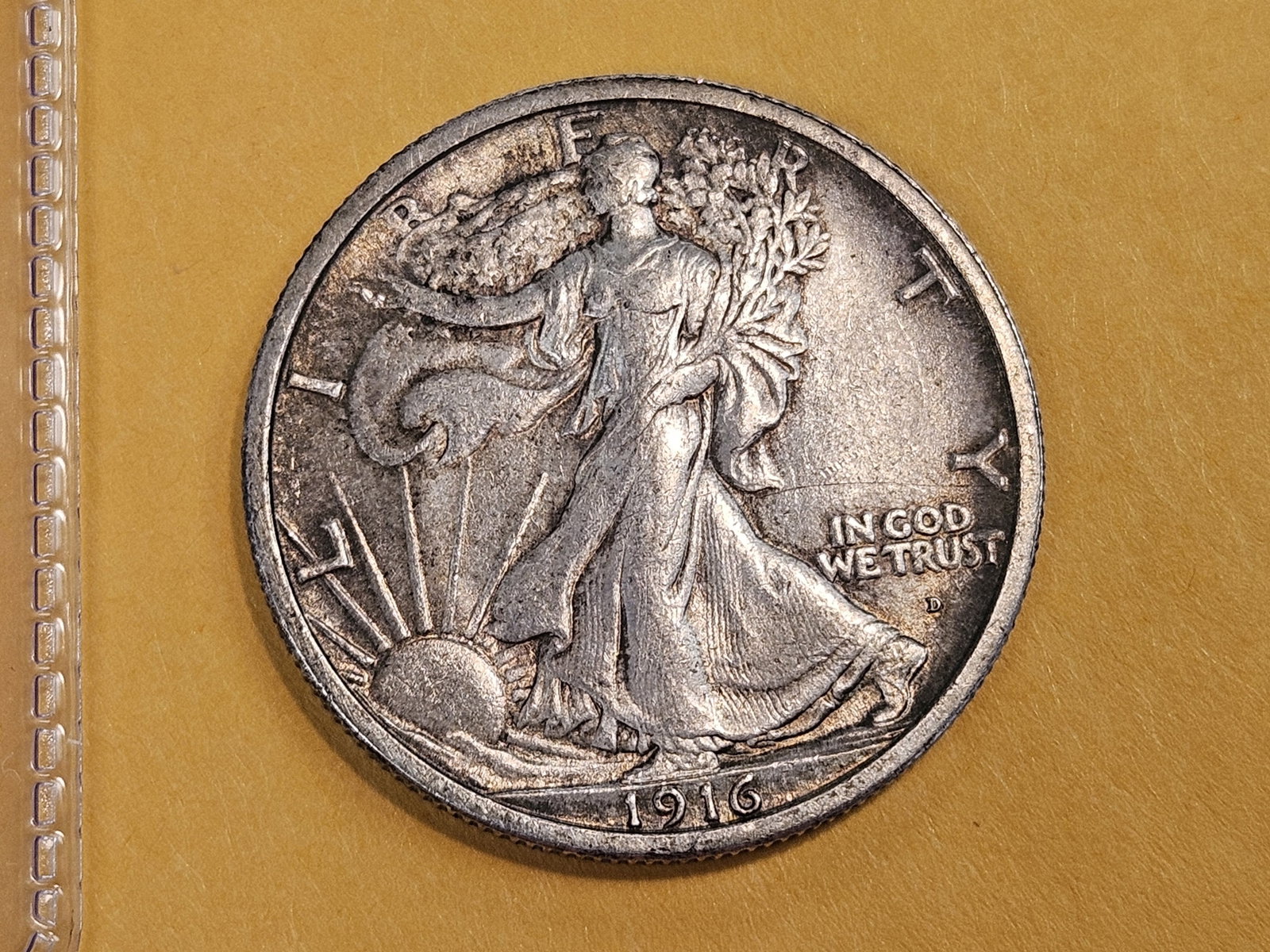 Semi-Key 1916-D Walking Liberty Half Dollar: In SHARP About Uncirculated - 58. Pretty much uncirculated for all intents and purposes