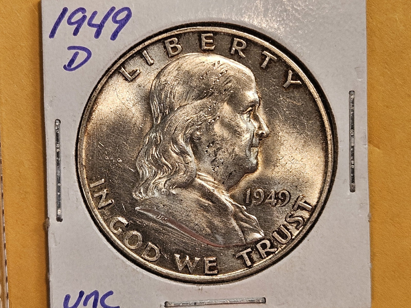 Brilliant Uncirculated plus 1949-D Franklin Half Dollar: Near Full Bell Lines