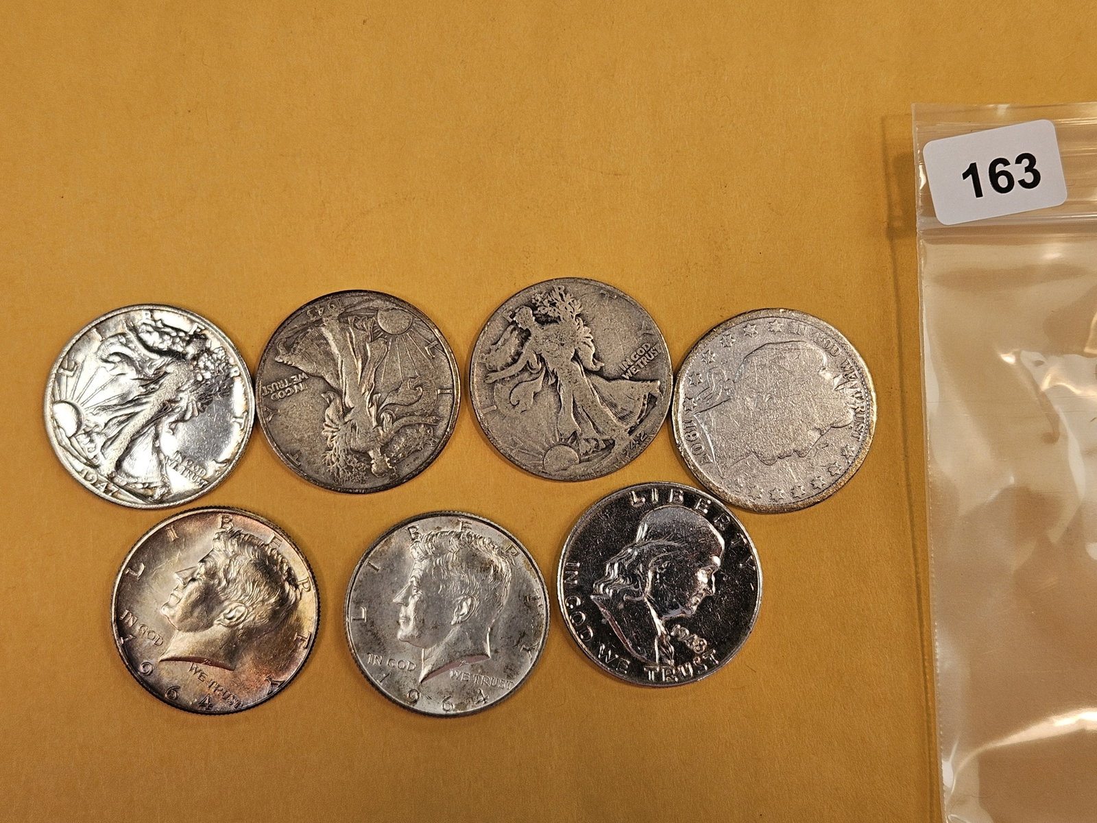 Seven mixed silver Half Dollars: All 90%