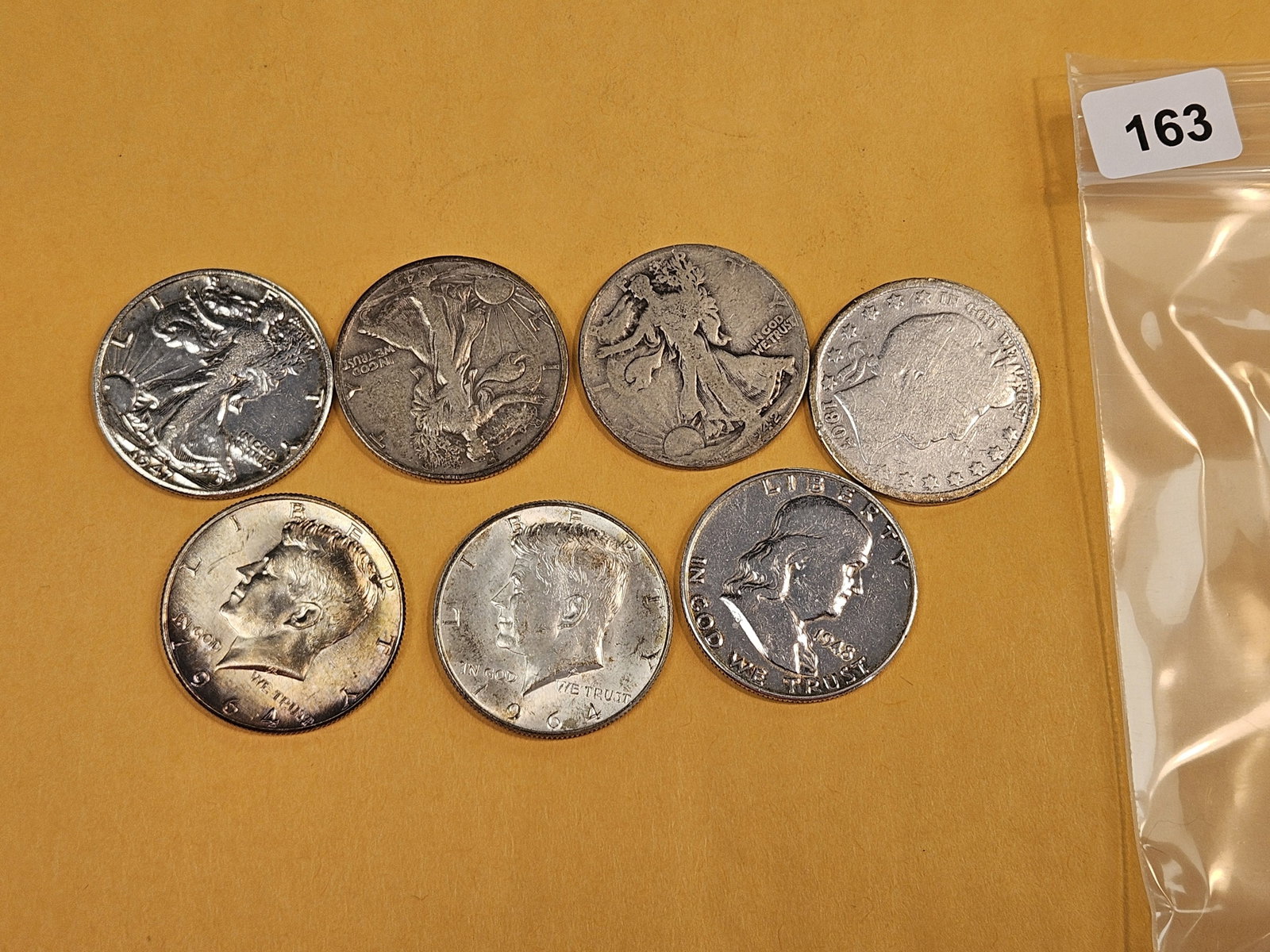 Seven mixed silver Half Dollars - 2