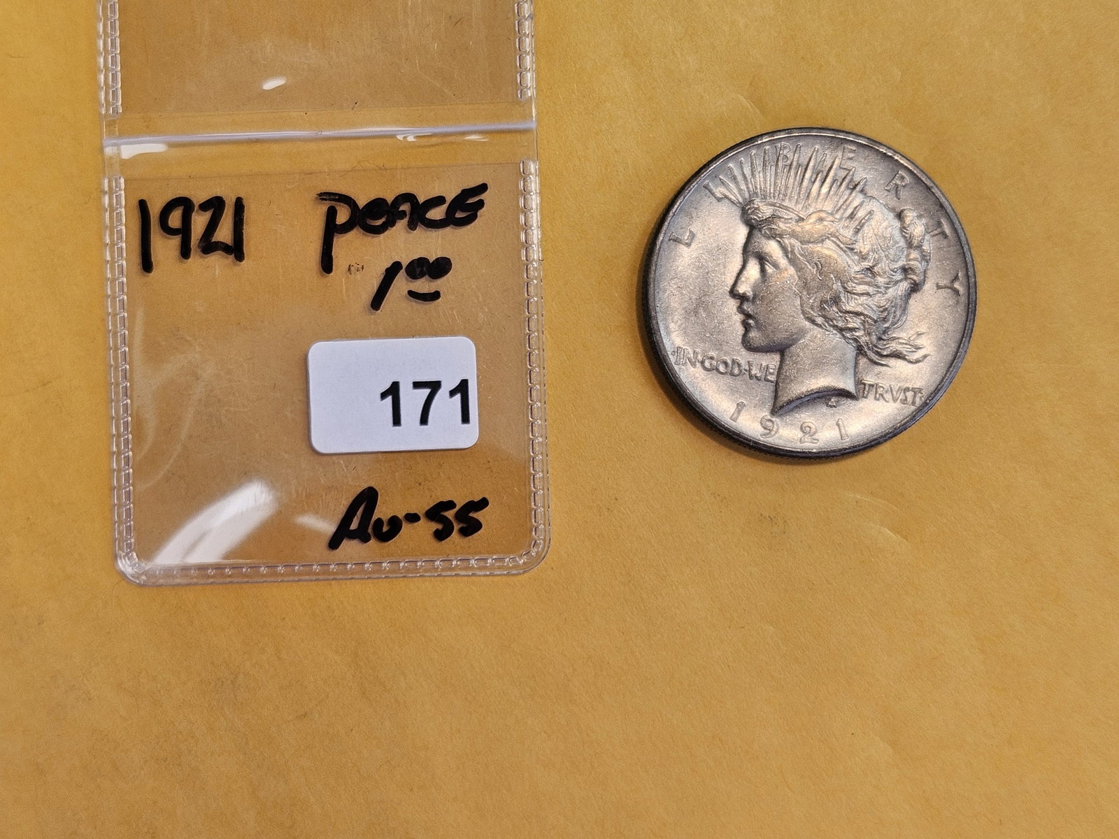 ** KEY DATE ** 1921 Peace Silver Dollar in About Uncirculated - 55 - 2