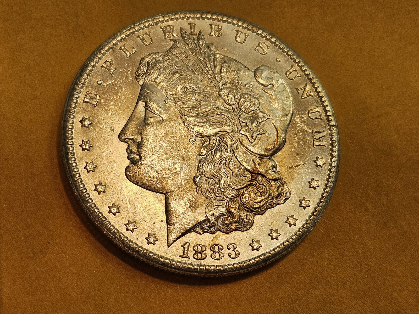 ** KEY DATE ** 1883-CC Morgan Dollar in Very Choice Brilliant Uncirculated - 3