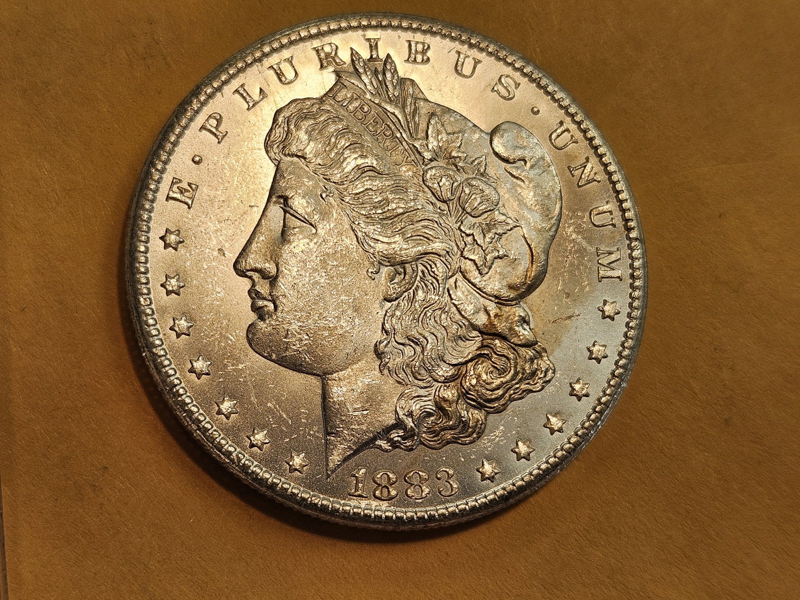 ** KEY DATE ** 1883-CC Morgan Dollar in Very Choice Brilliant Uncirculated - 4