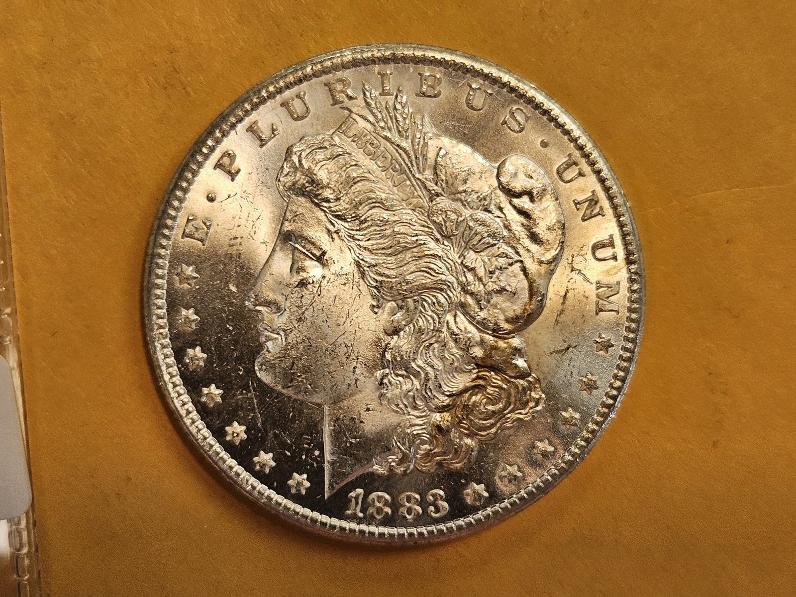 ** KEY DATE ** 1883-CC Morgan Dollar in Very Choice Brilliant Uncirculated - 5