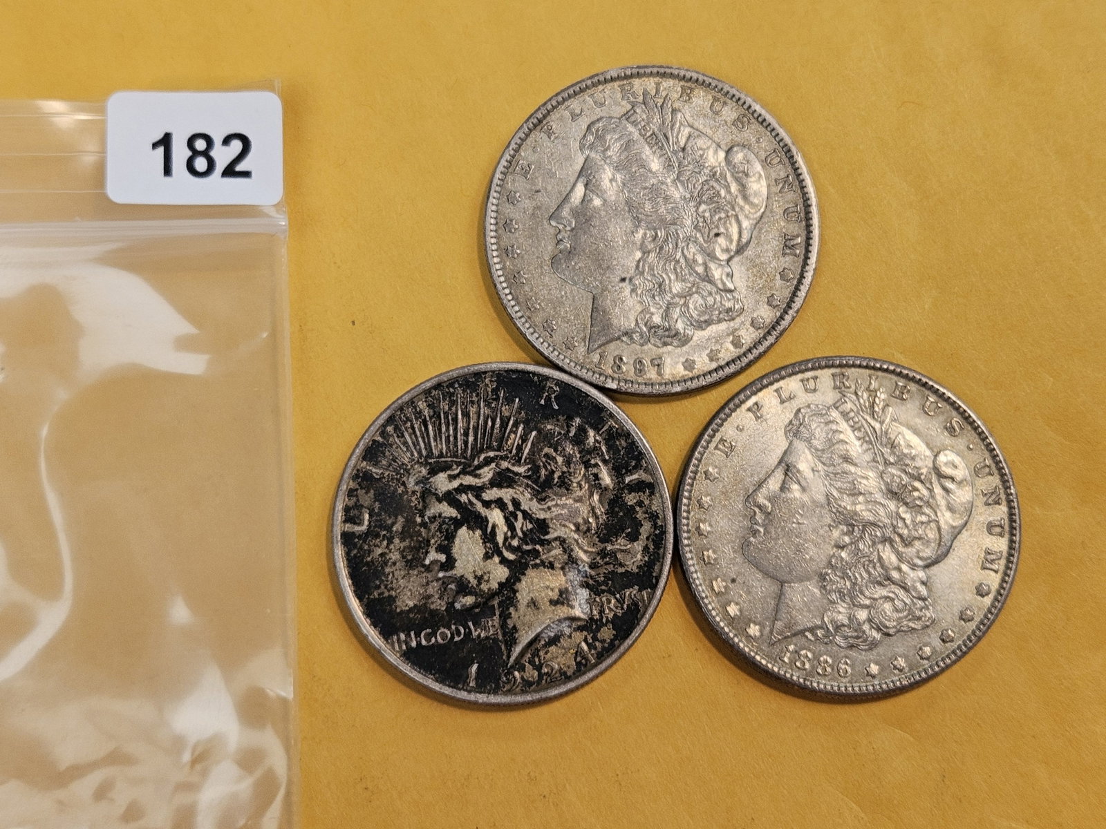 Three mixed silver Dollars: Peace and Morgan