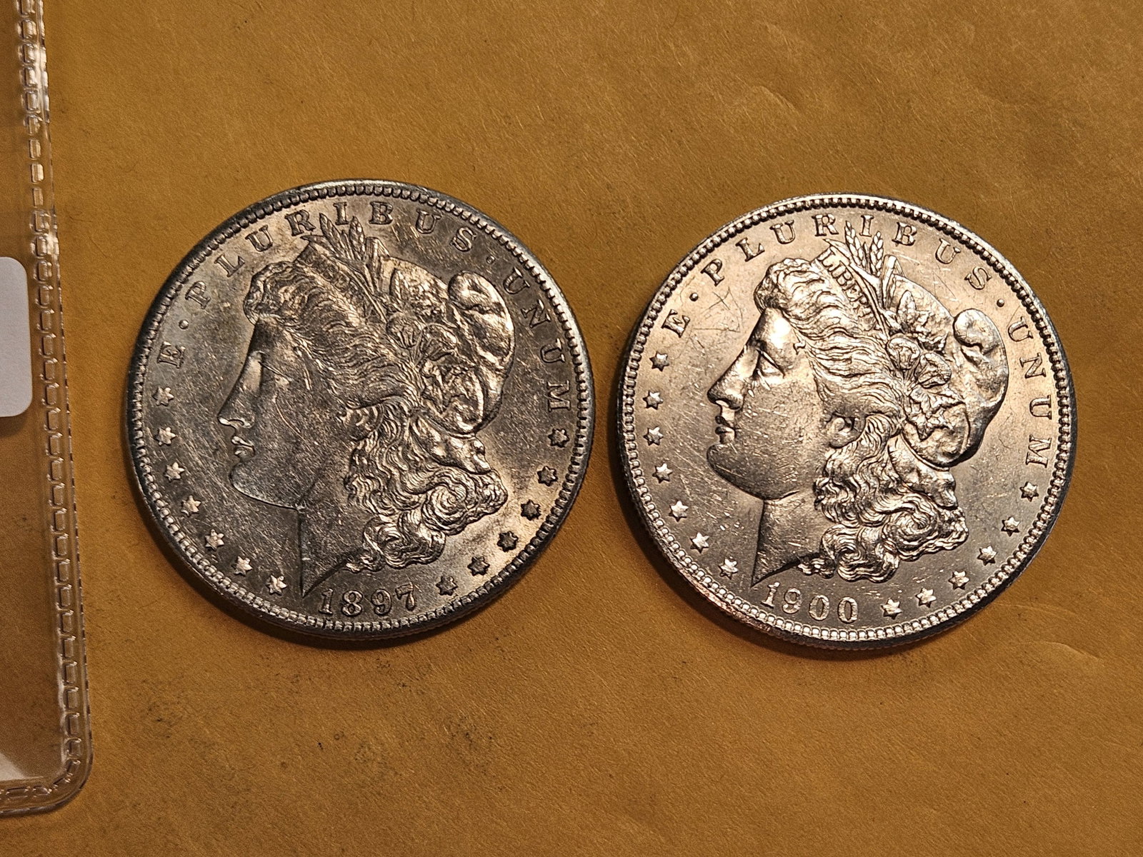 Two Brilliant About Uncirculated Morgan silver Dollars: Mixed.