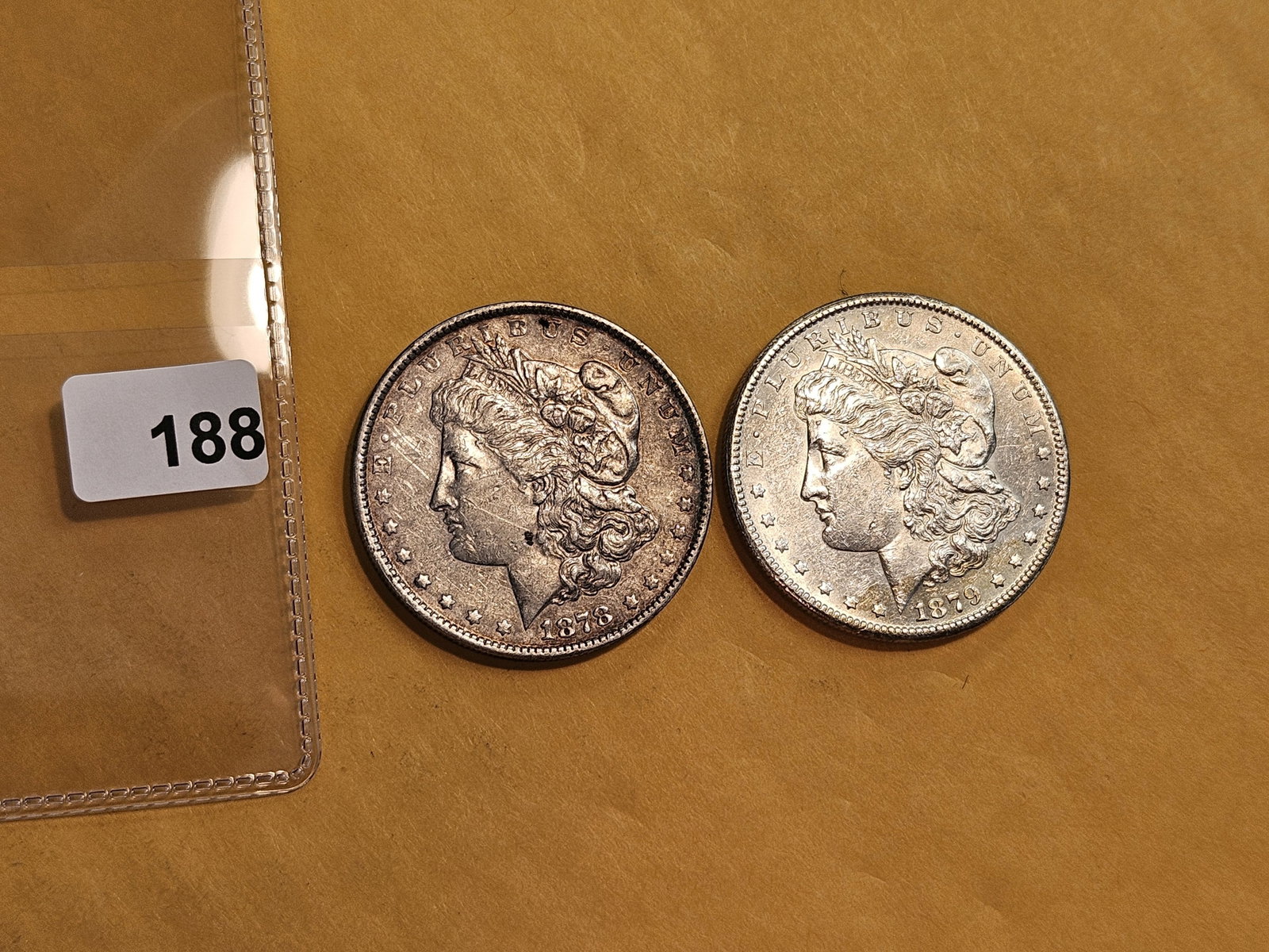 Two About Uncirculated Morgan silver Dollars - 2