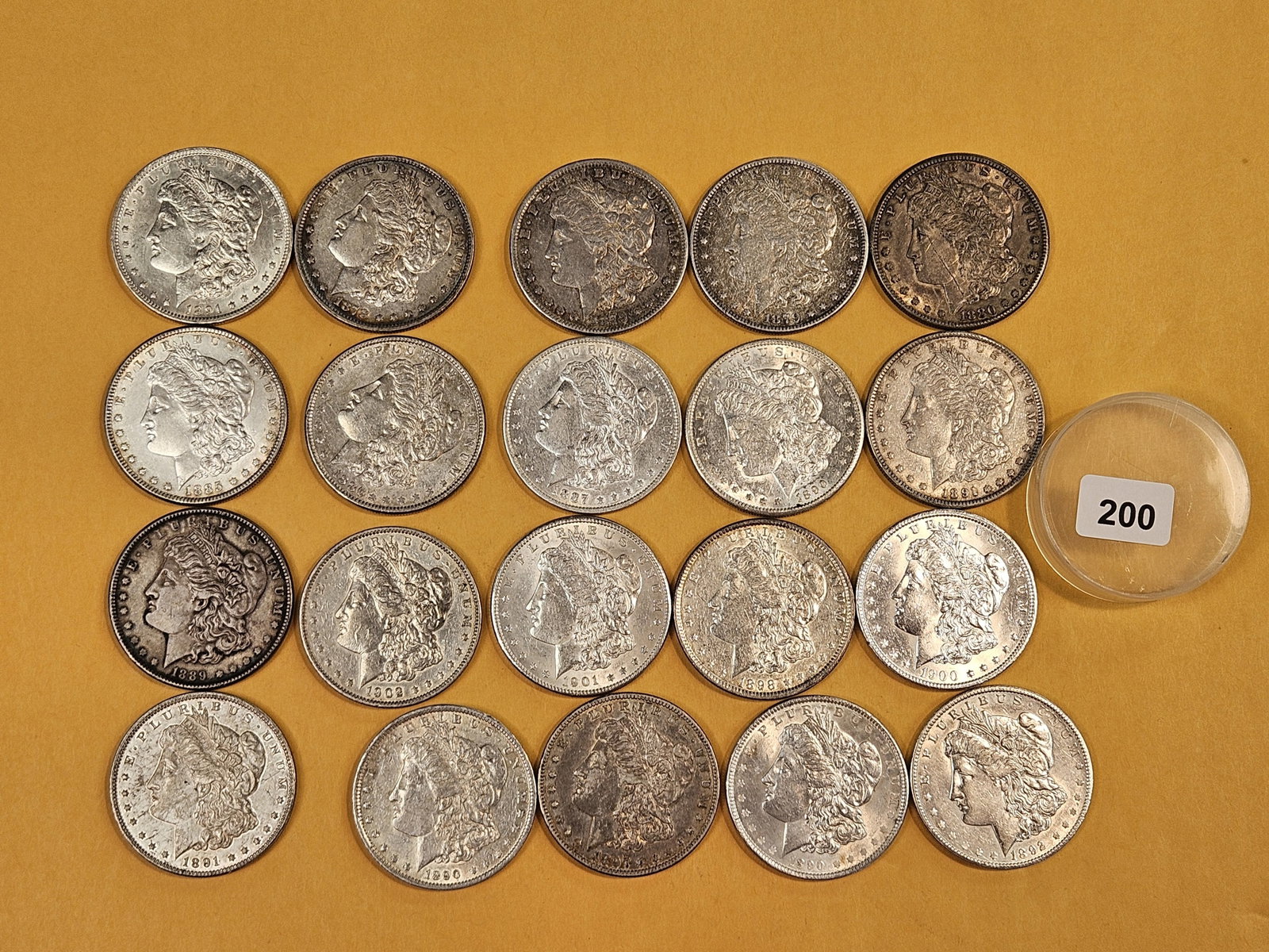 ** FULL ROLL ** Twenty Morgan Silver Dollars: All pre-1904. Grades from Extra Fine through Brilliant Uncirculated plus - Details