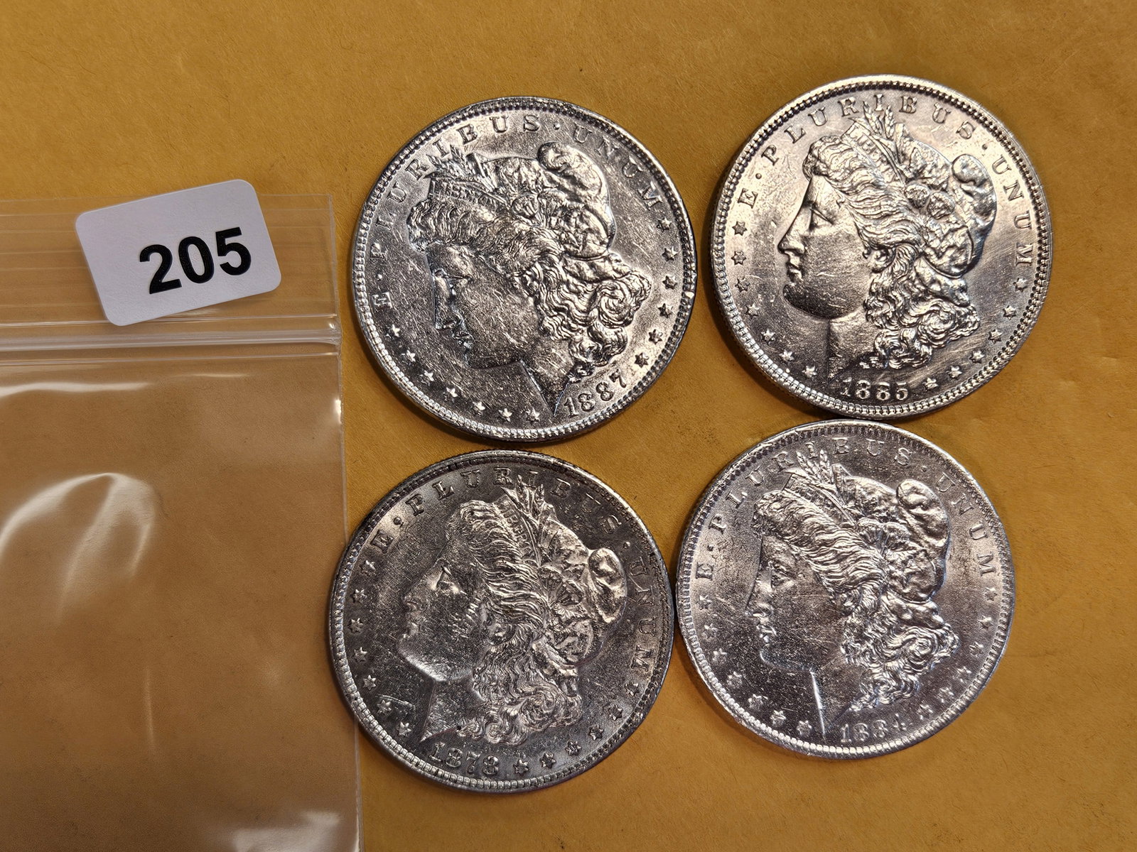 Four Brilliant About Uncirculated Morgan silver Dollars: Mixed.