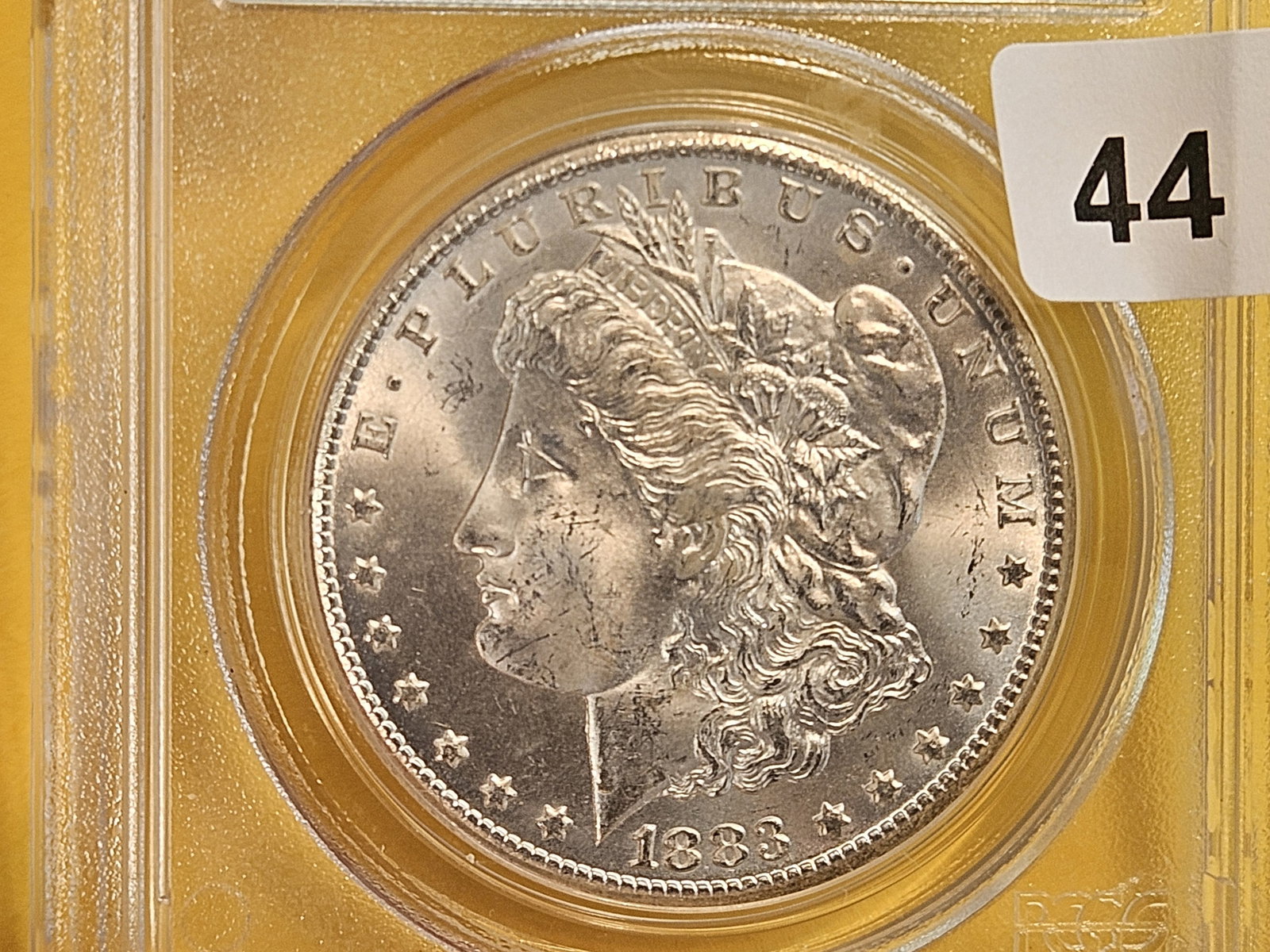 ** KEY DATE ** PCGS OGH 1883-CC Morgan Dollar in Mint State 64 - 3