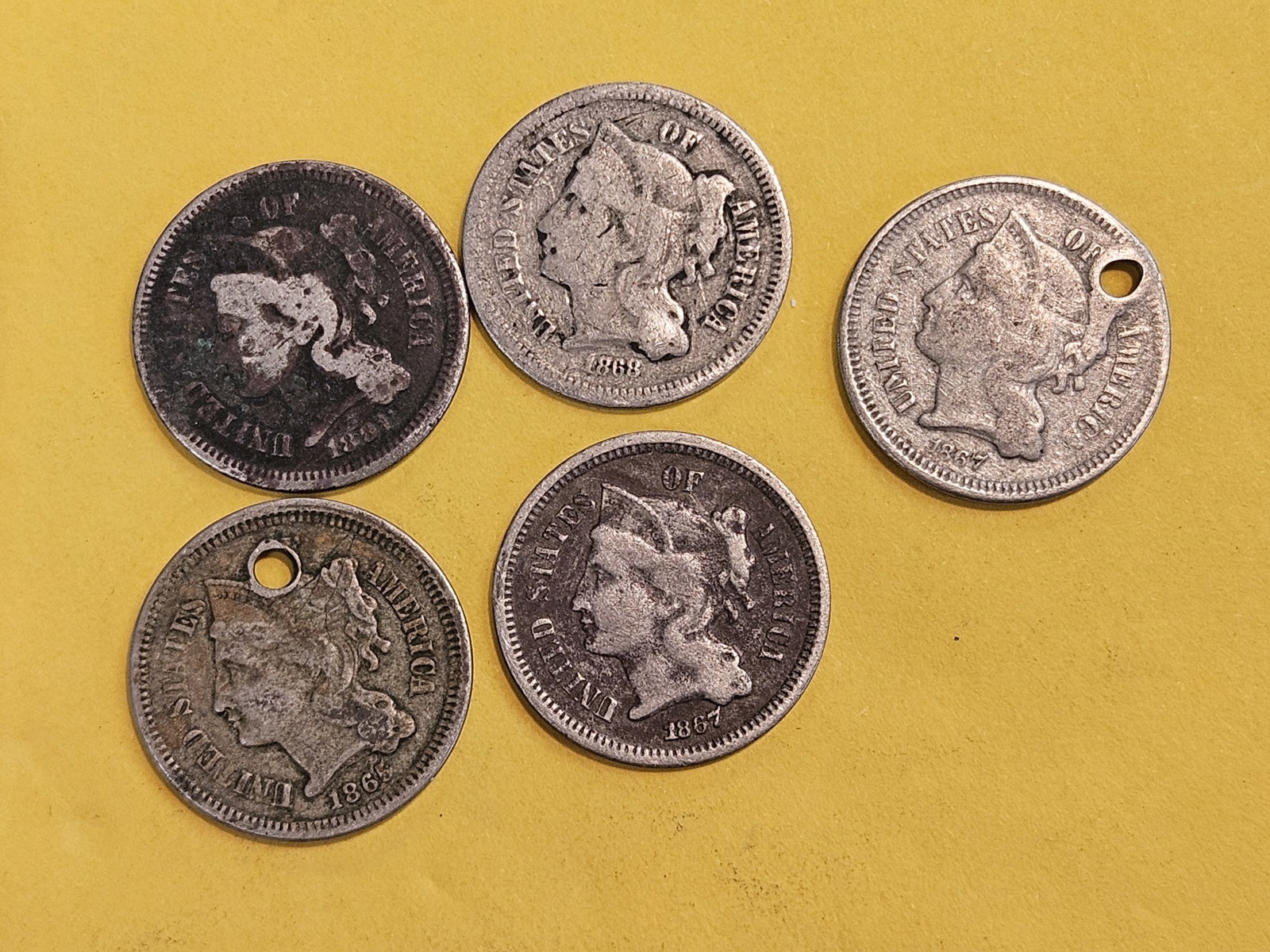 Five mixed 3-Cent Nickels: All well circulated or with issues