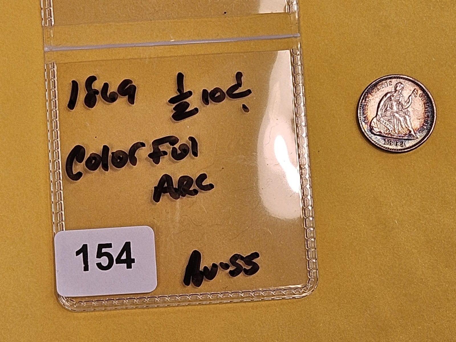 Brilliant About Uncirculated Plus 1869 Seated Liberty silver Half-Dime - 2