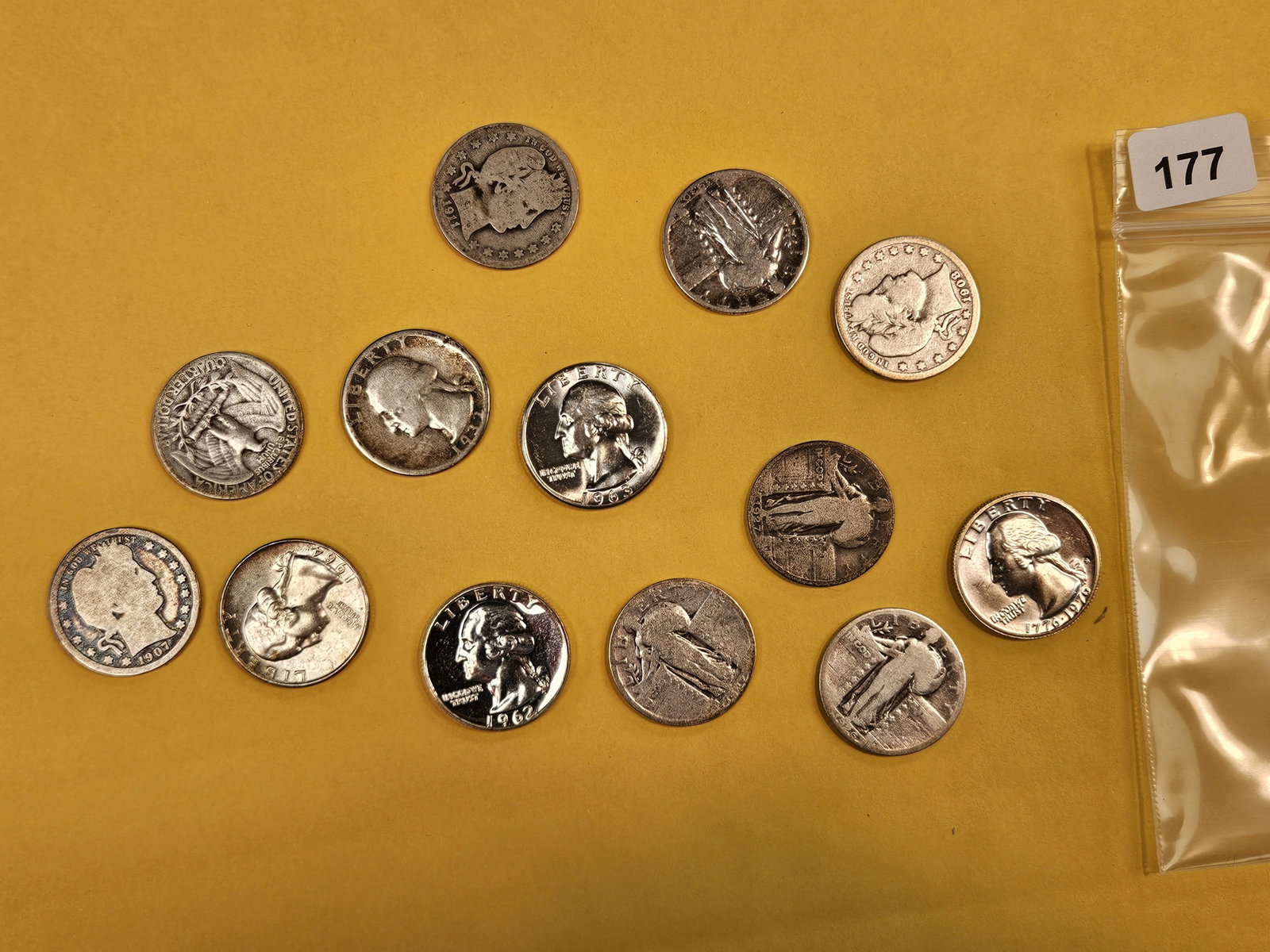 Thirteen mixed silver Quarters (1 of 2)