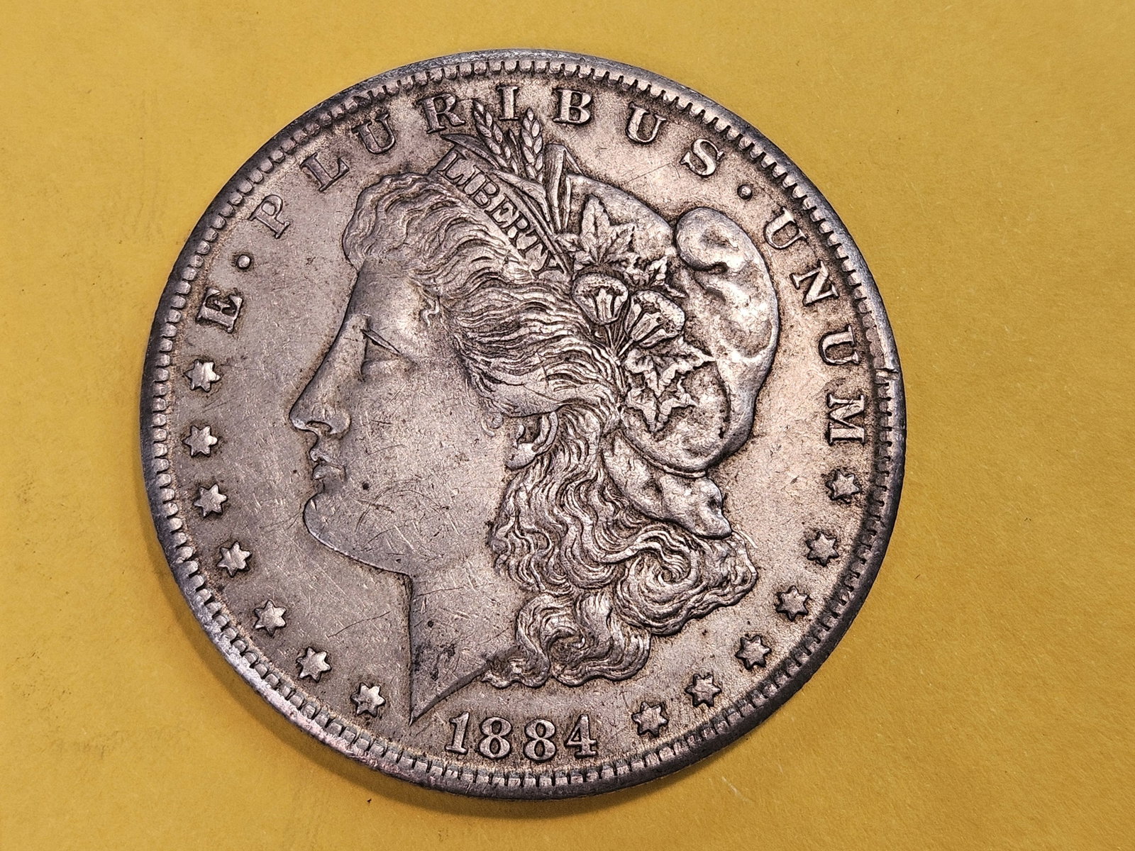 ** KEY DATE ** 1884-CC Morgan Dollar in About Uncirculated: KEY DATE! CARSON CITY!