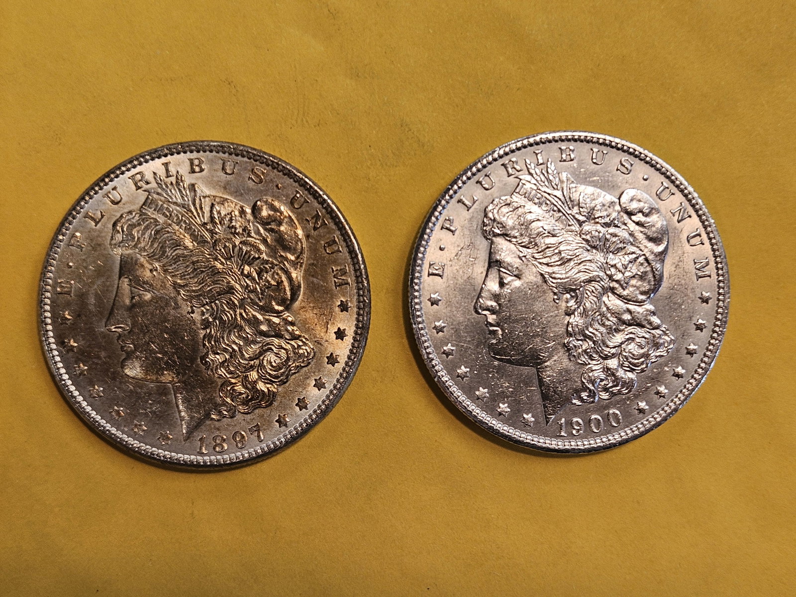 Two Brilliant About Uncirculated Plus Morgan Dollars: Mixed