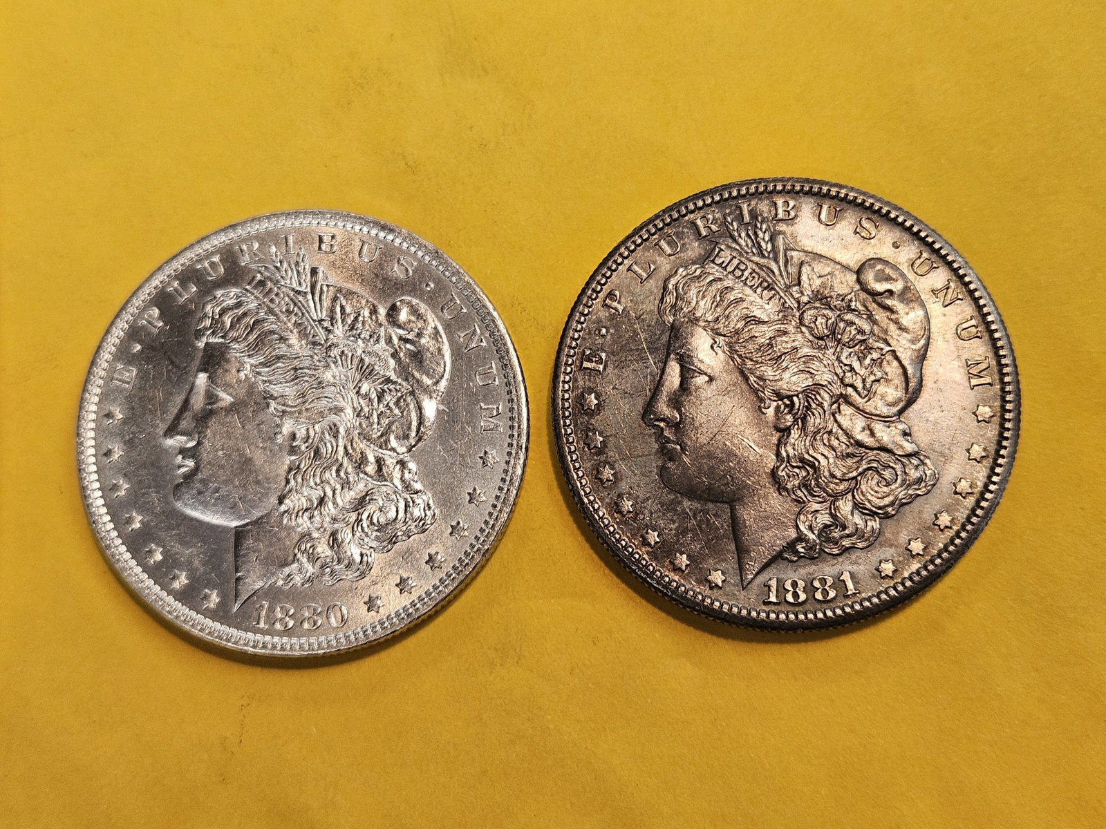 Two Brilliant About Uncirculated Plus Morgan Dollars: Mixed