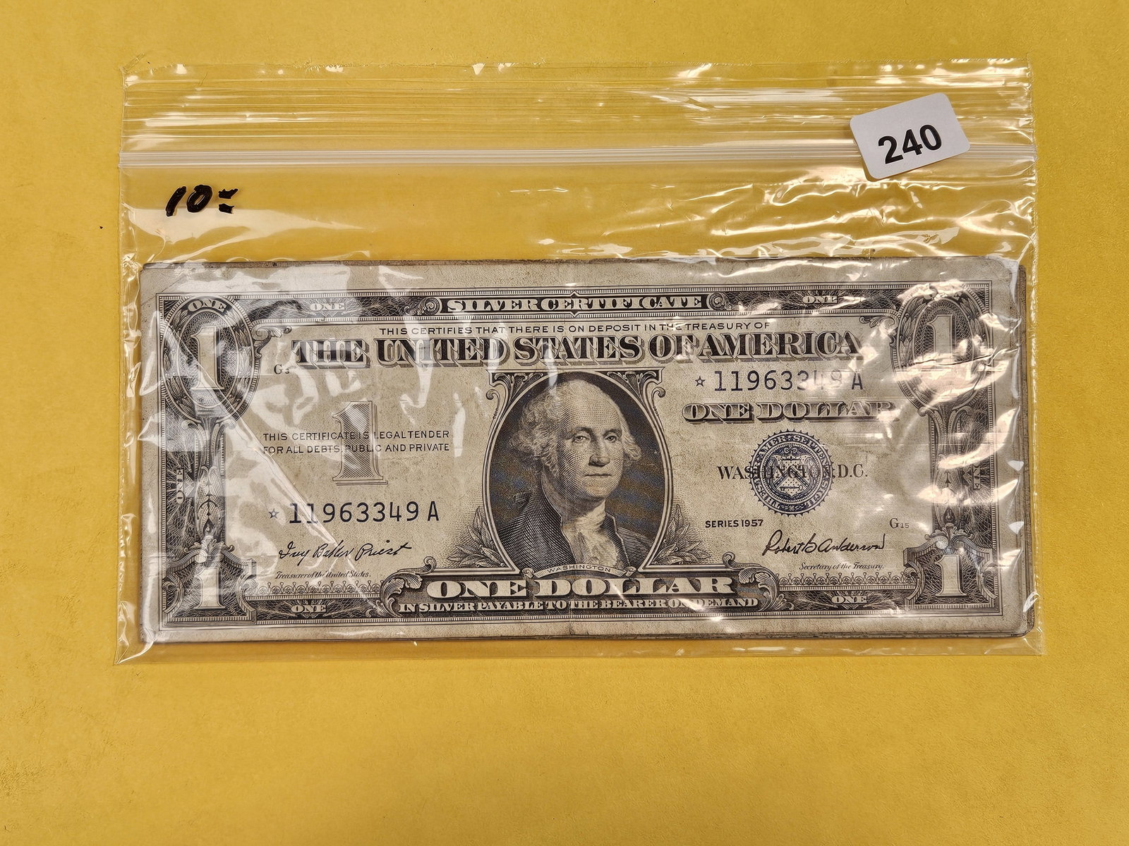Ten $1 Silver Certificates: From dealer. Unchecked by us